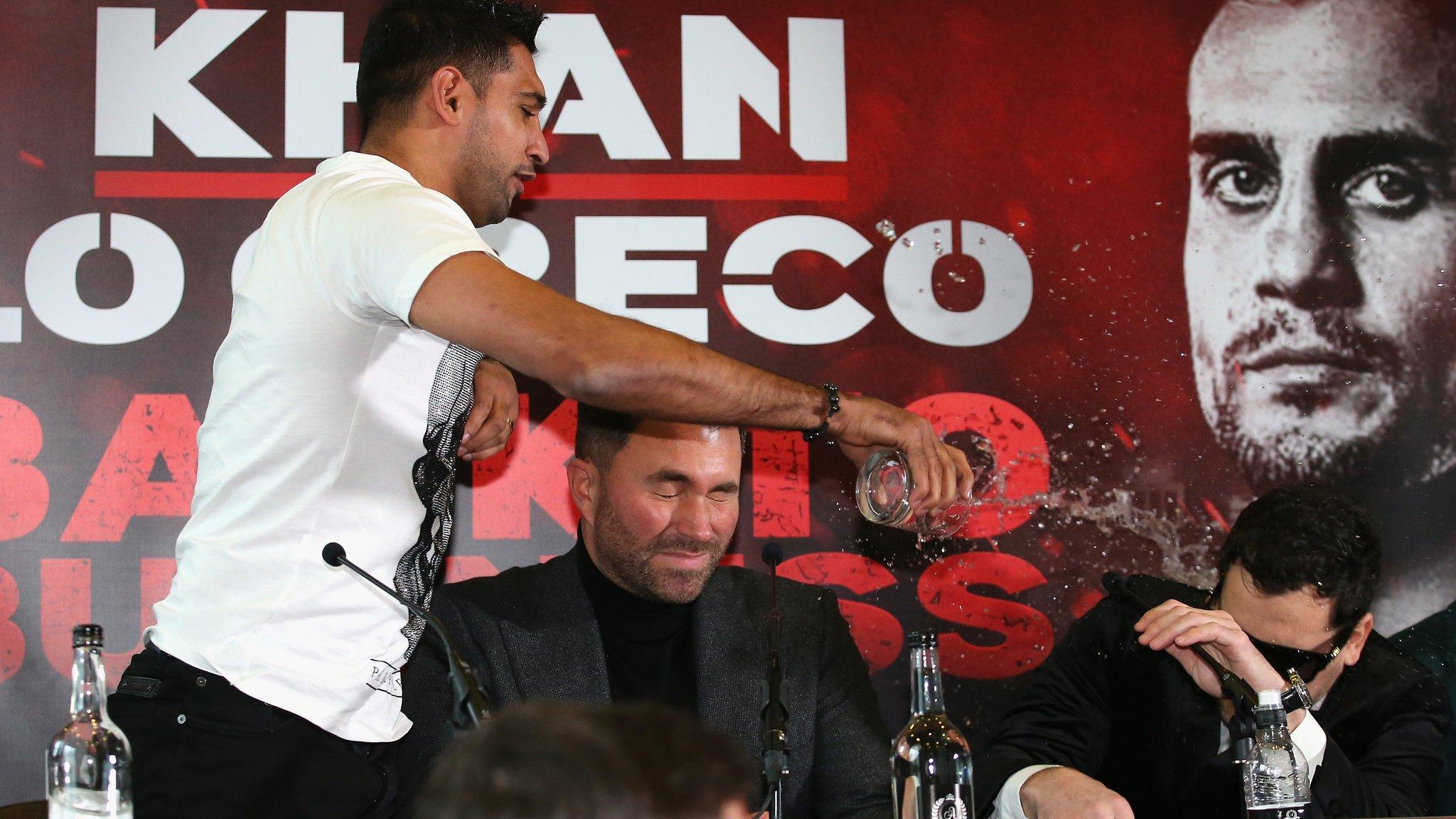 Amir Khan throws water over Phil Lo Greco