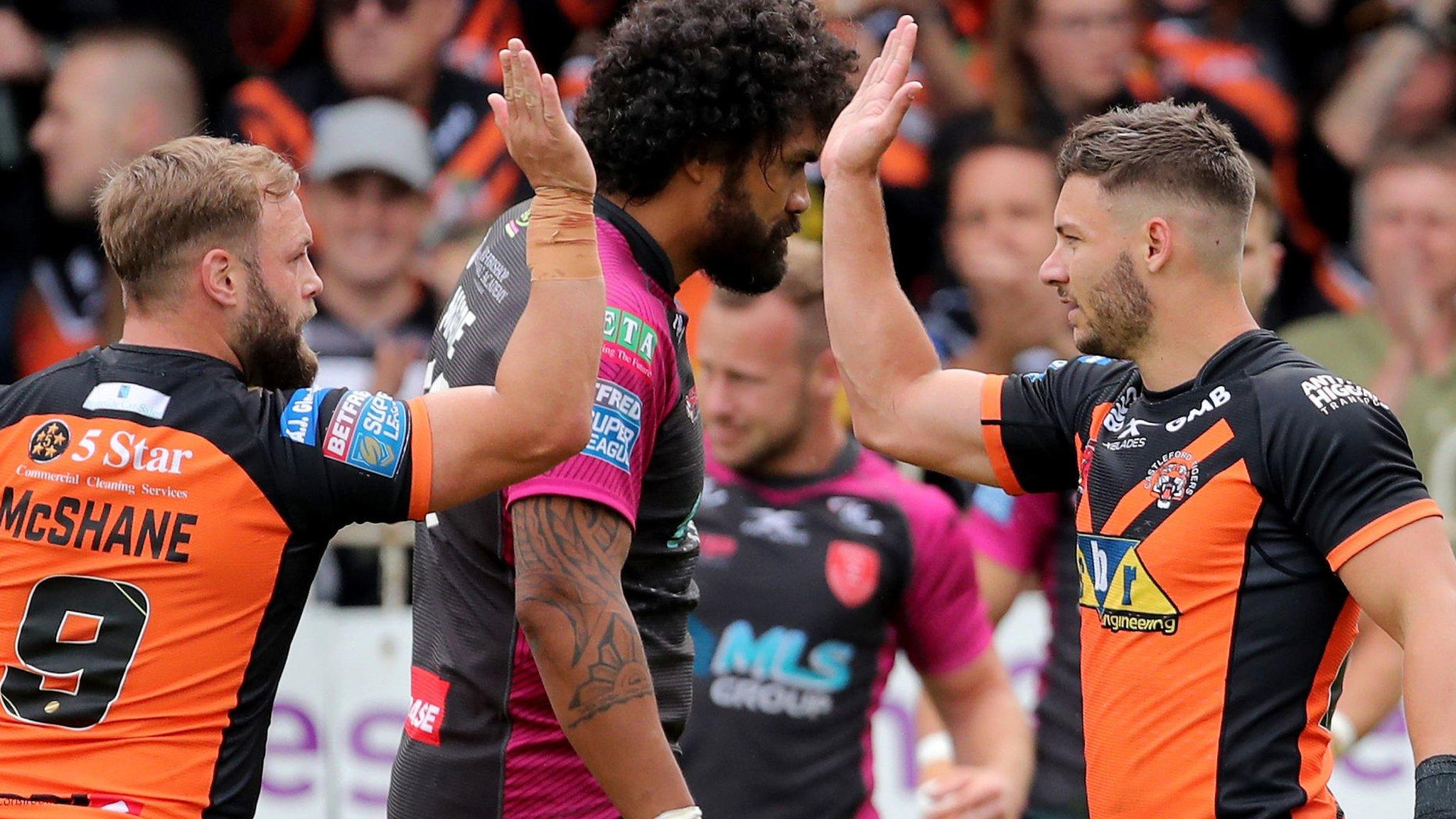 Jy Hitchcox (right) celebrates a try