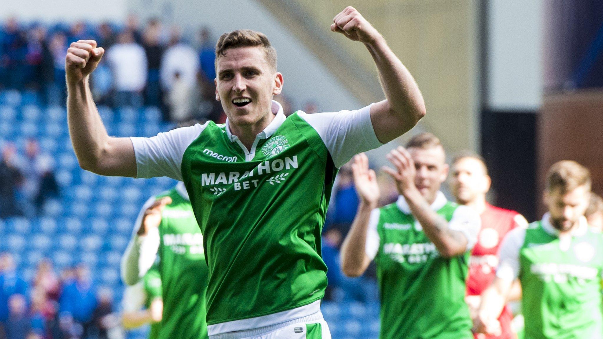 Hibs defender Paul Hanlon celebrates a 3-2 win at Ibrox in August