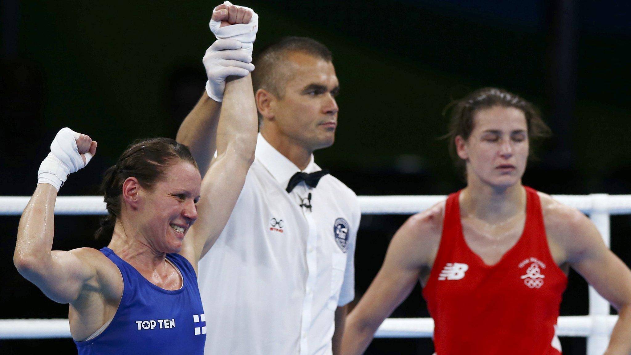 Mira Potkonen is declared the winner against a dejected Katie Taylor in the lightweight quarter-final