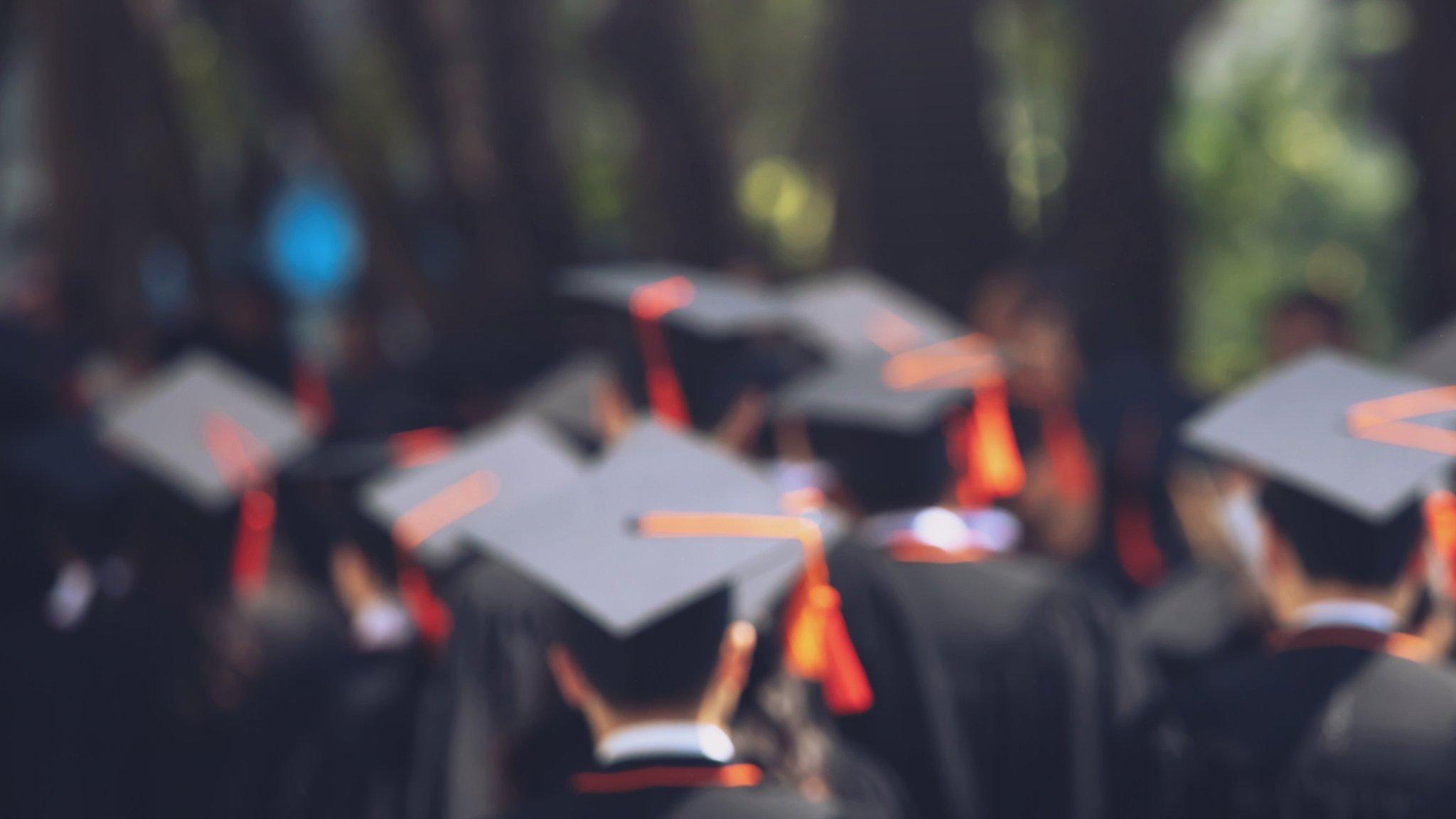 Students in caps and gowns