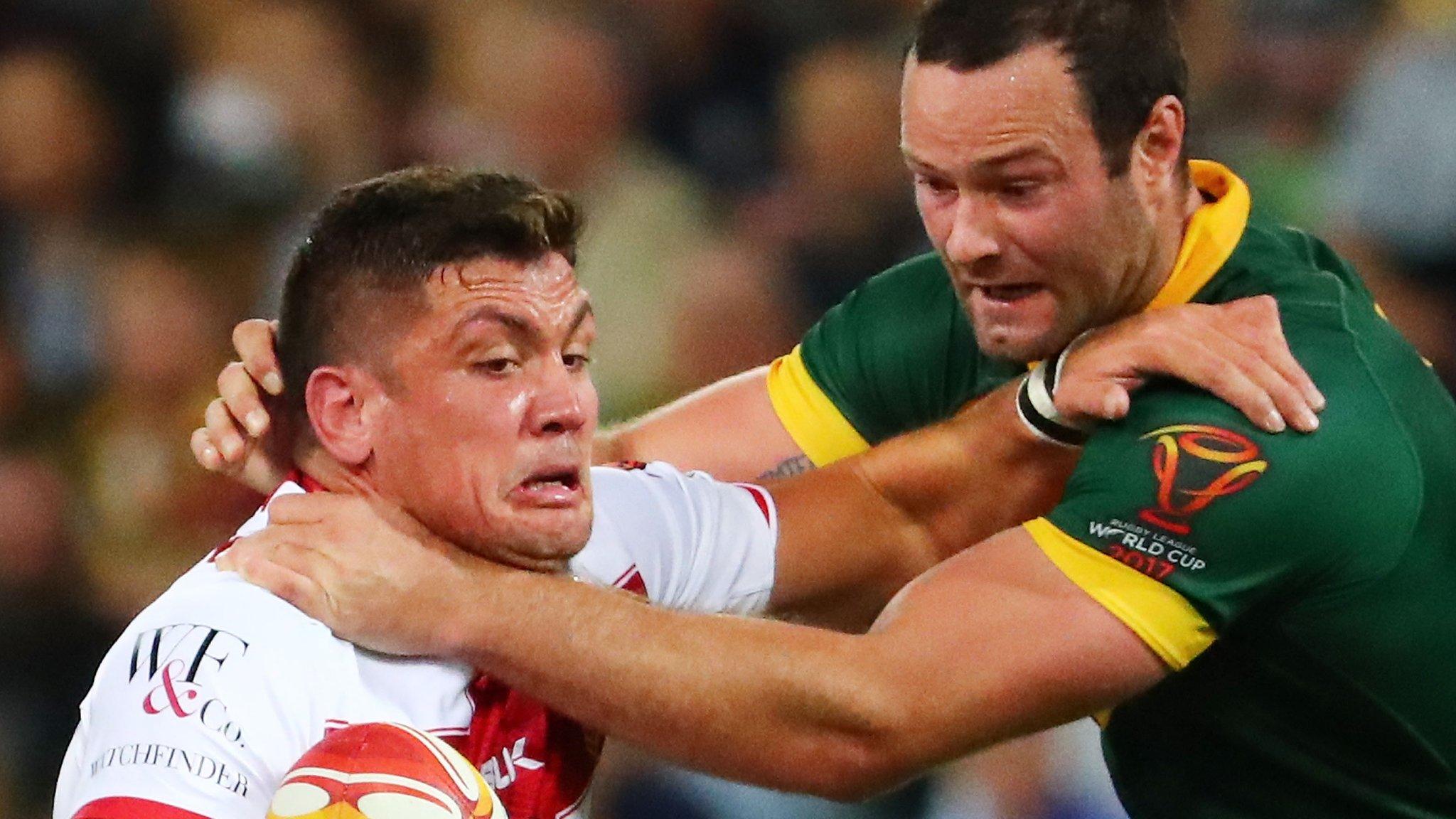 England's Chris Heighington (left)