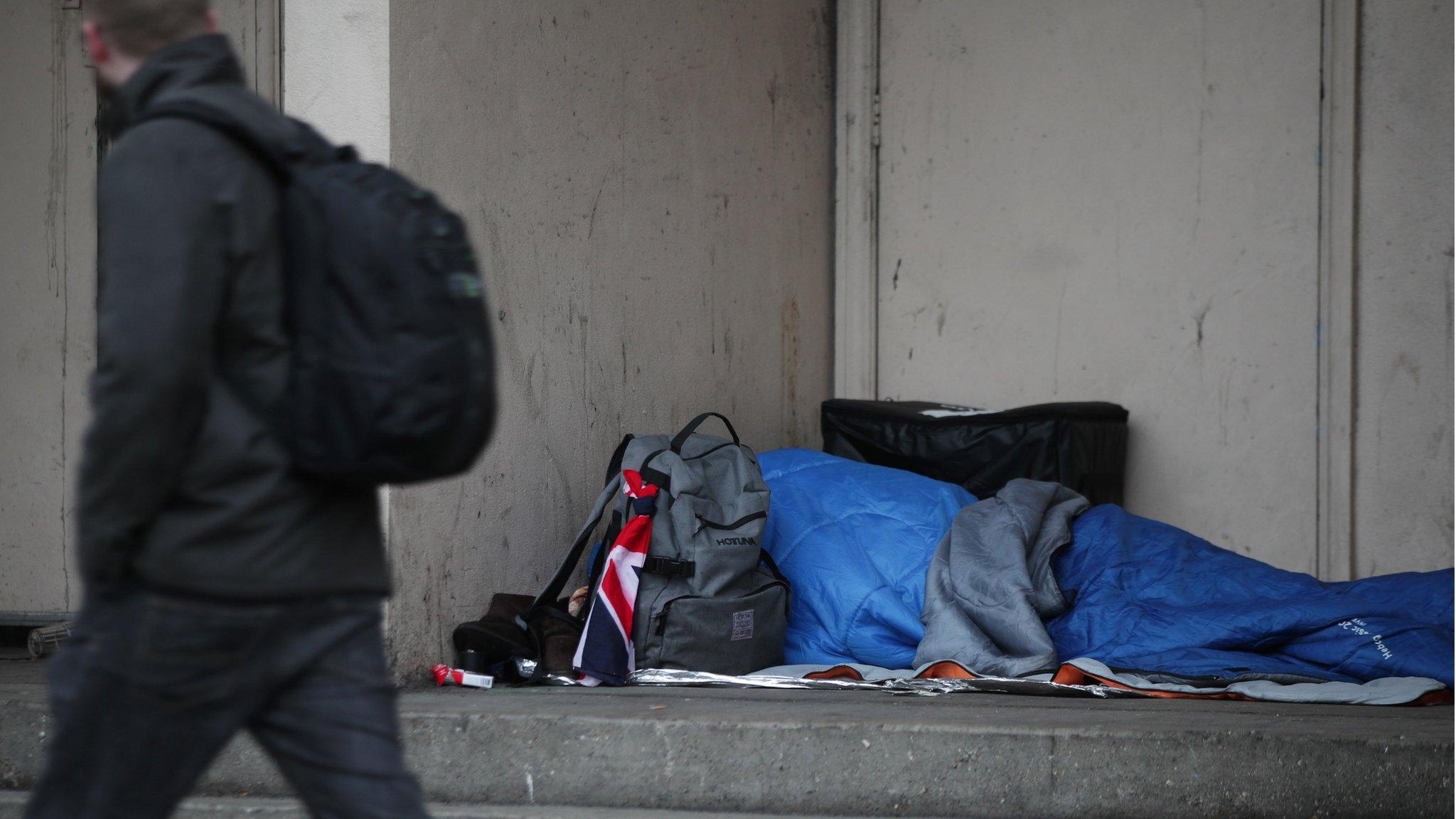 Homeless person sleeping rough in Farringdon