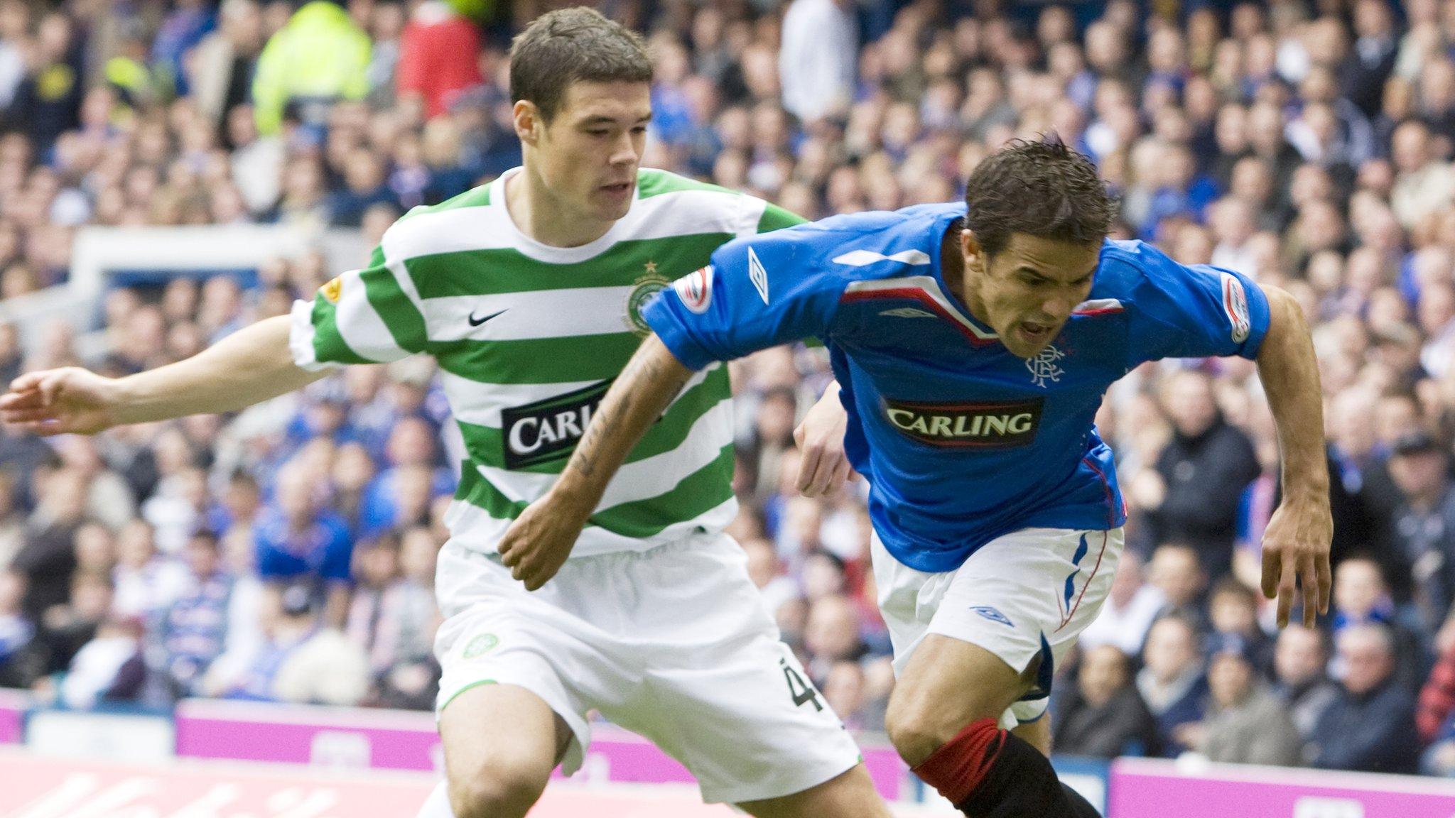 Celtic's Darren O'Dea tackles Rangers striker Nacho Novo