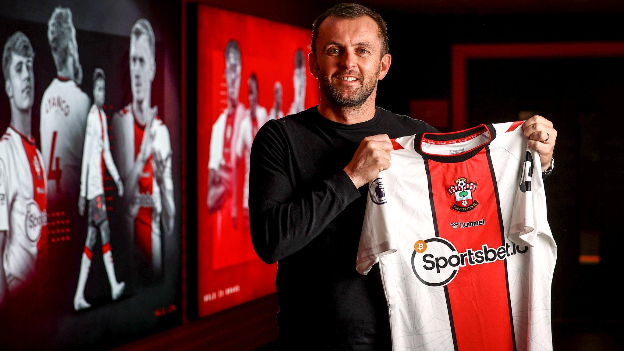 Nathan Jones holds Southampton shirt