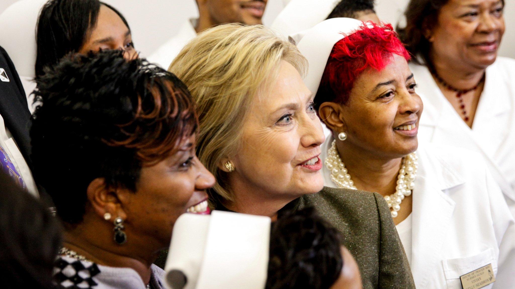 Hillary Clinton with voters in Flint, Michigan