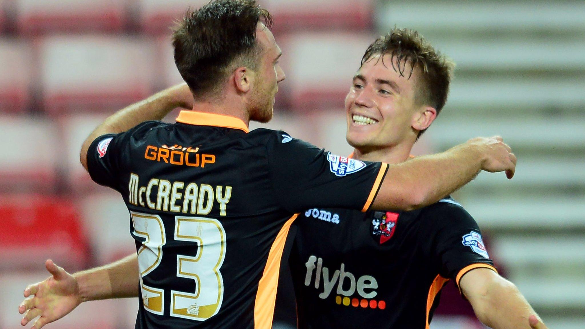 Tom McCready celebrates Exeter's third goal