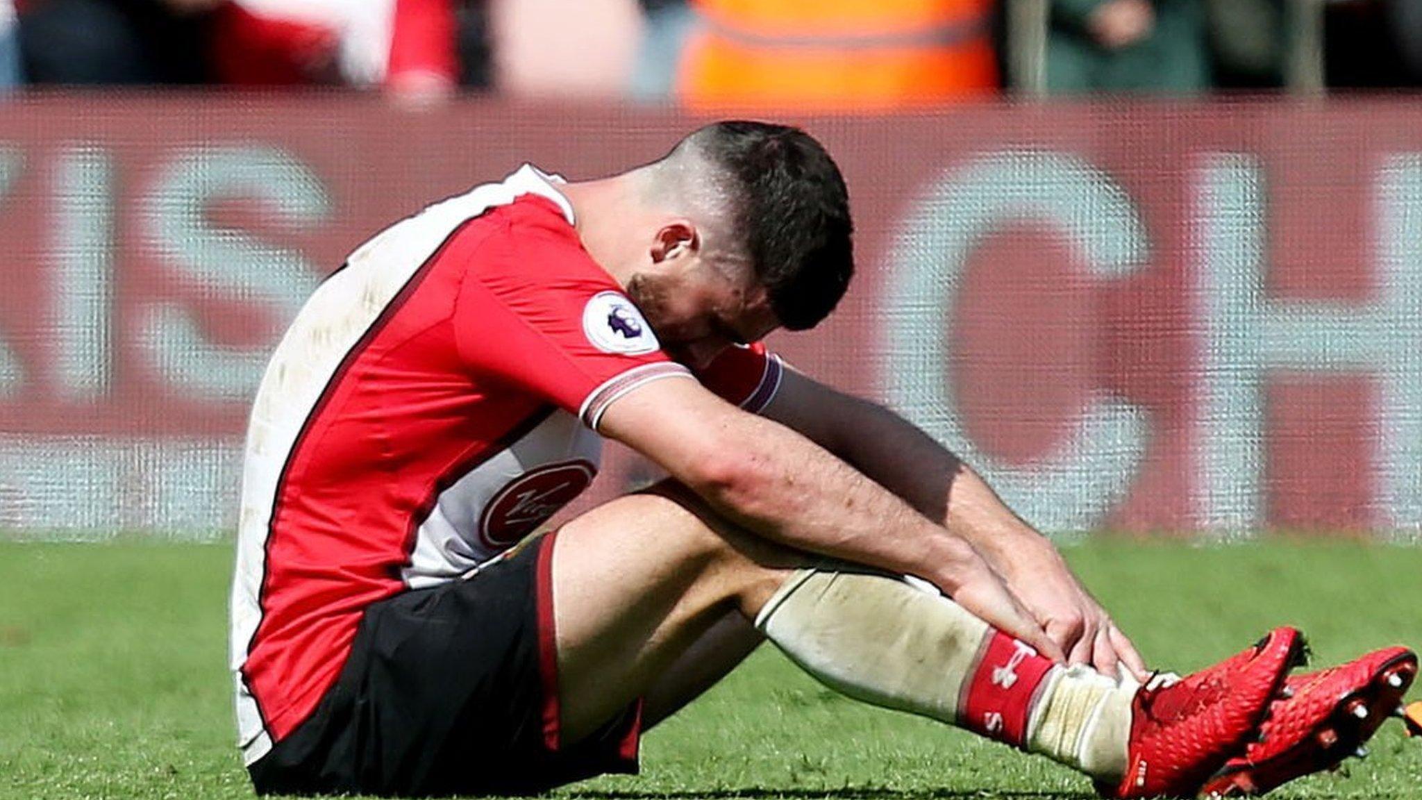 Southampton's players react after losing to Chelsea