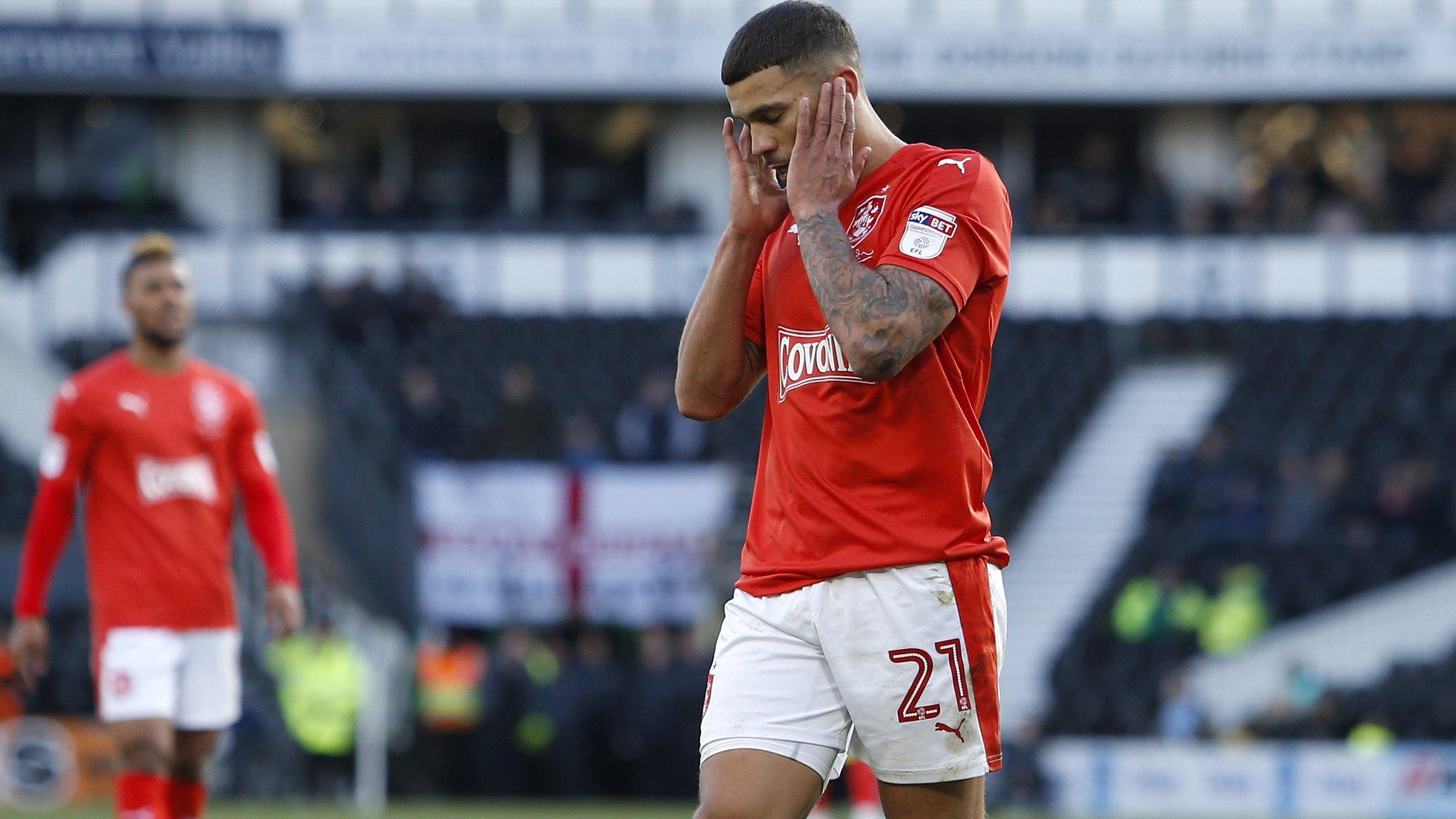 Huddersfield Town's Nakhi Wells shows his frustration