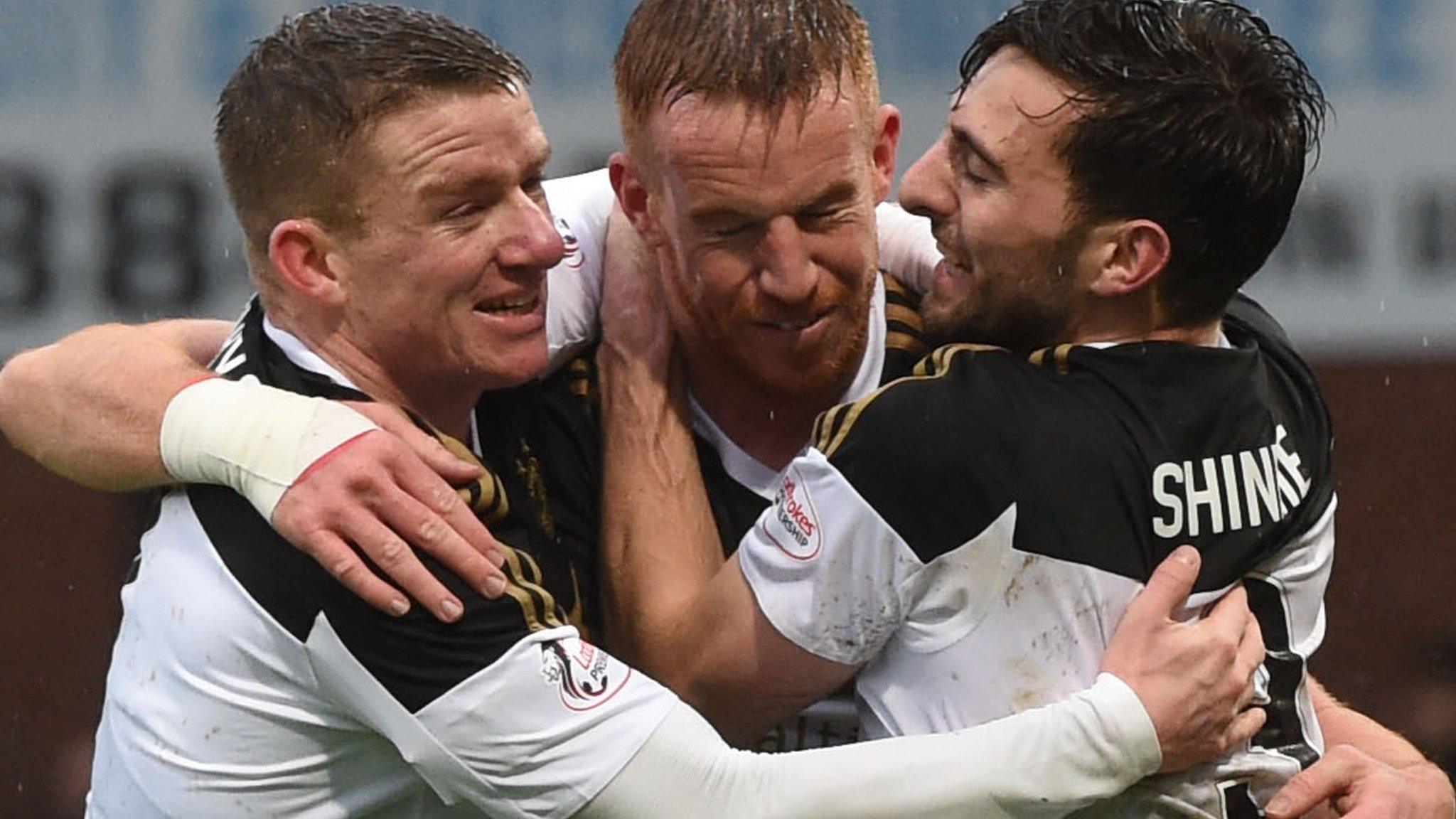 Aberdeen celebrate Adam Rooney's goal at Dens Park