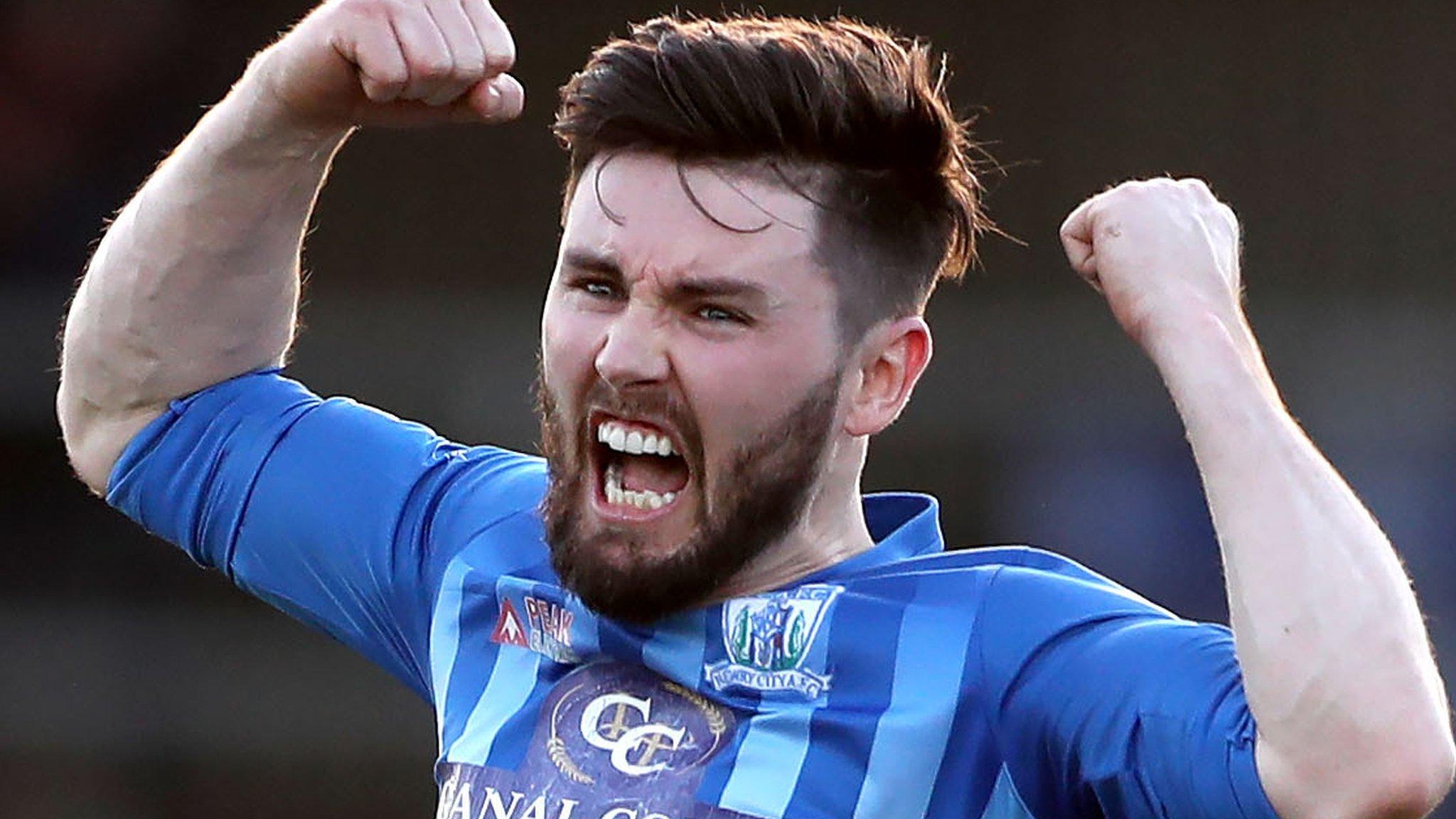 Newry's Darren King celebrates after Stephen Hughes scores against Carrick