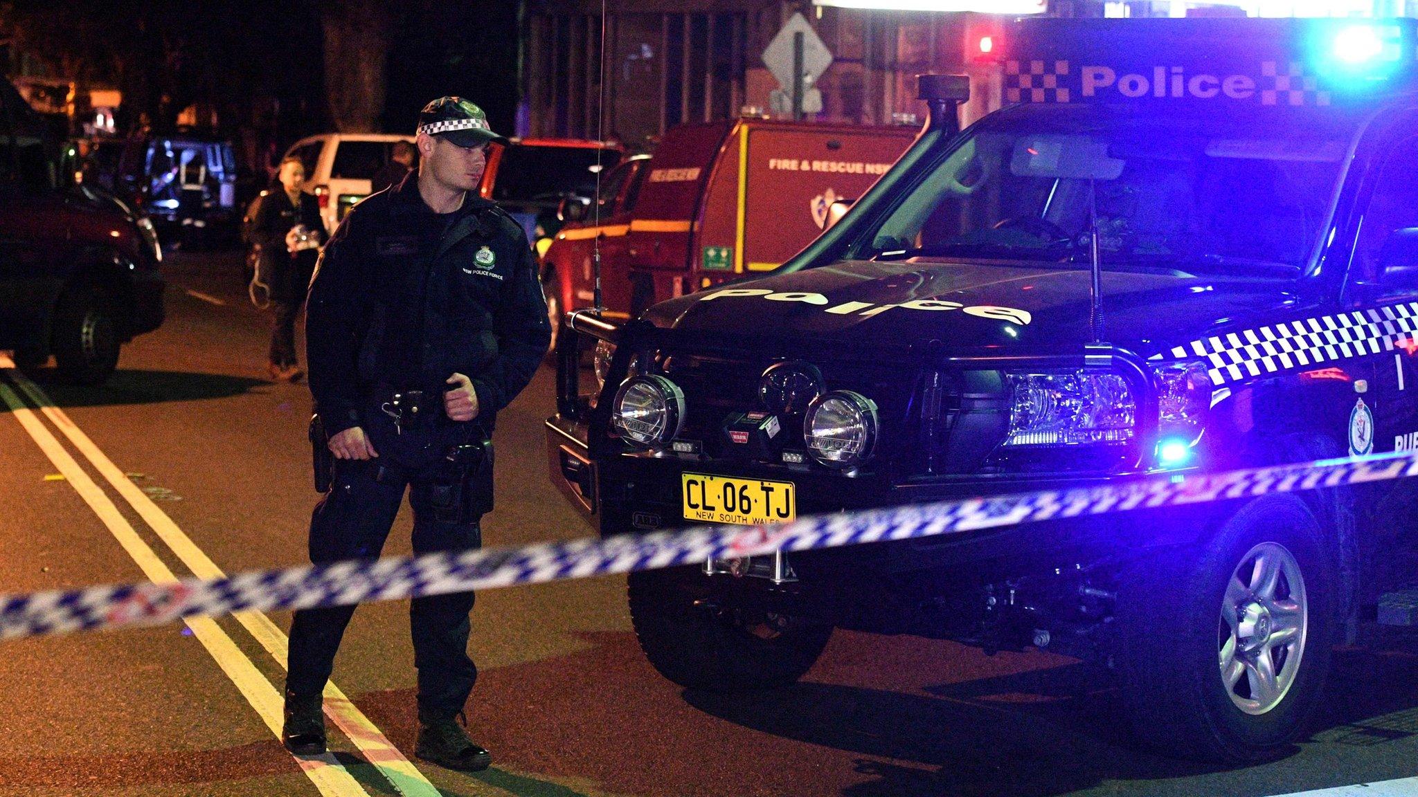 Police man a check point in the Sydney inner suburb of Surry Hills on July 29, 2017