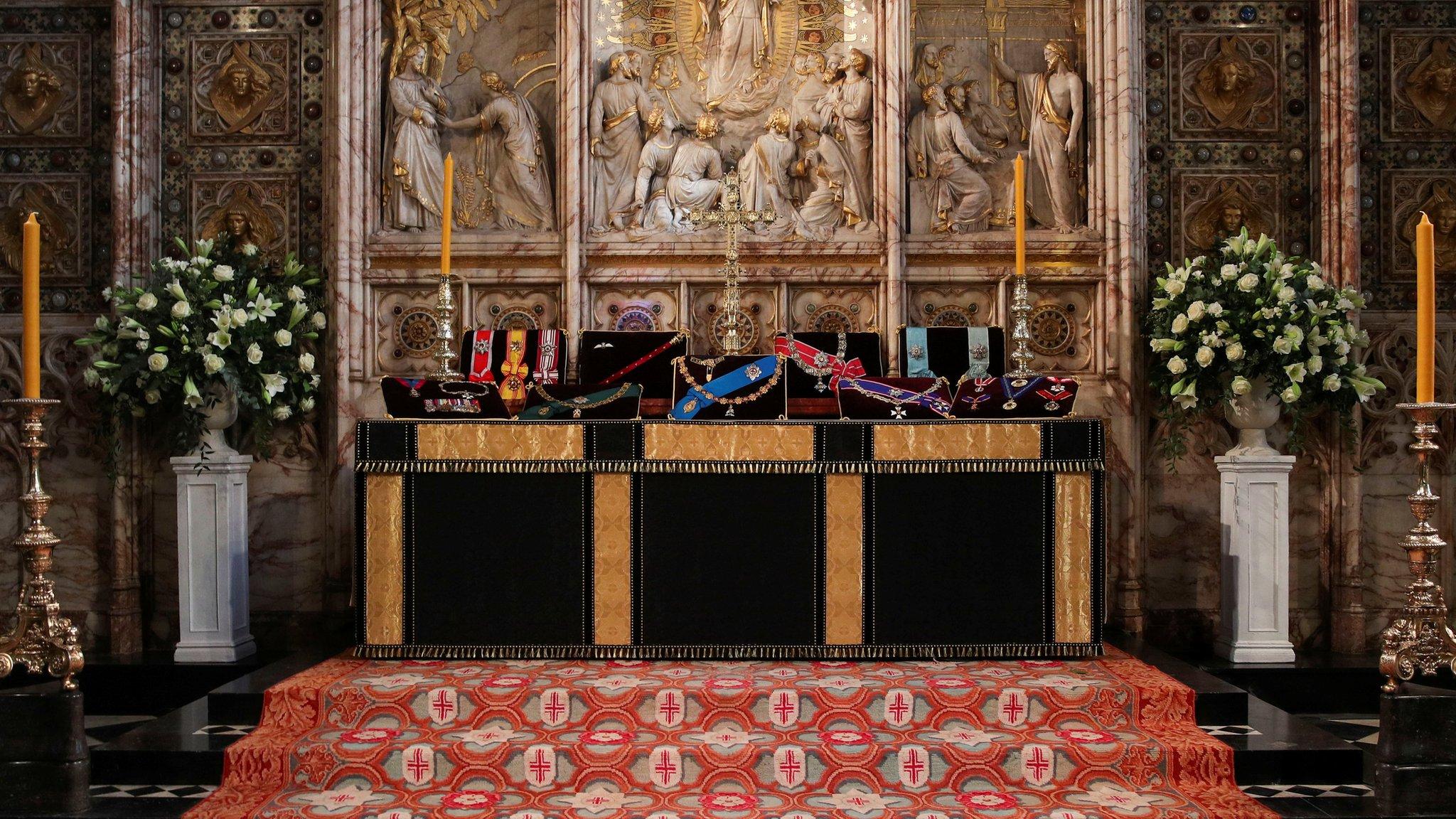 Insignia belonging to Britain's Prince Philip are placed on the altar in St George's Chapel, Windsor, ahead of his funeral, Britain