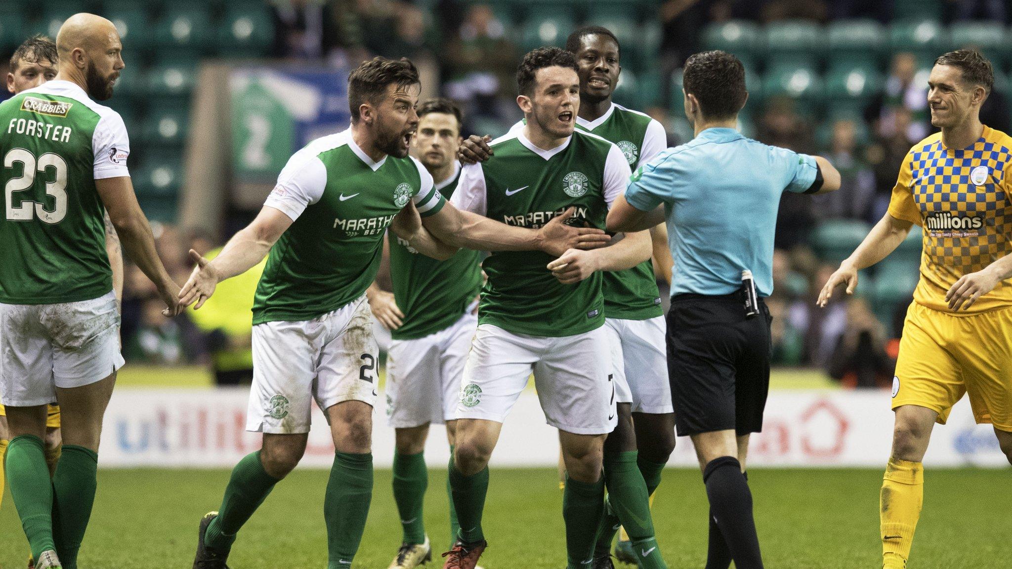 Darren McGregor (second from right) was sent off at Easter Road