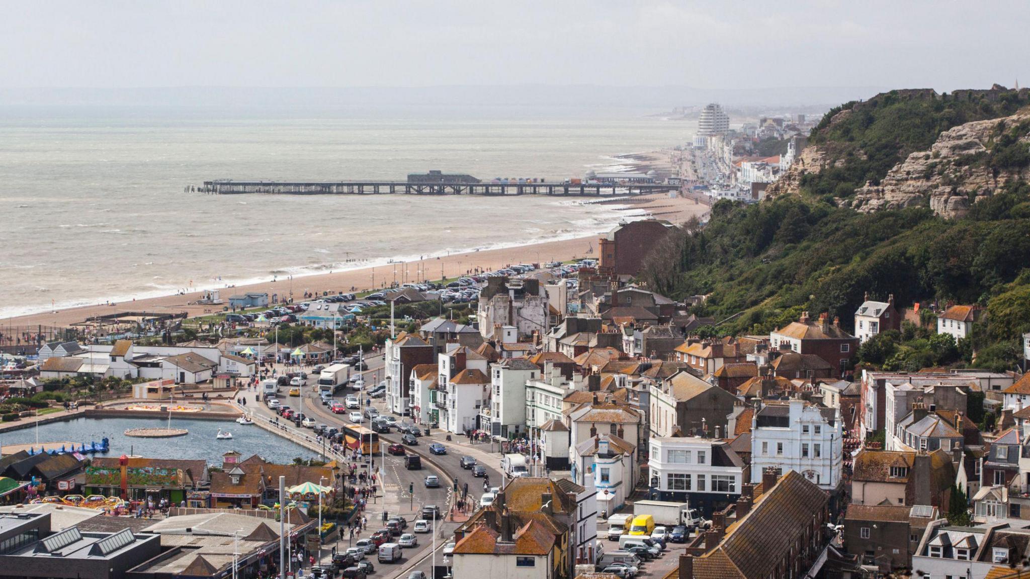 A coastal English town is seen for afar.