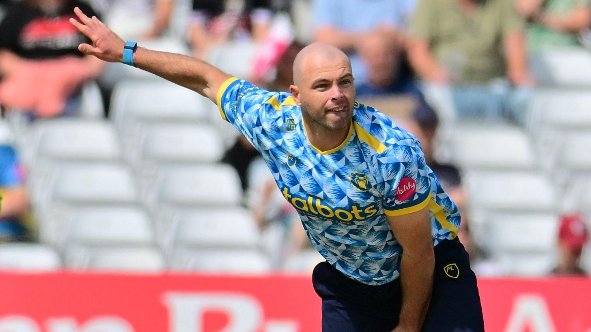 Jake Lintoff bowls a ball during a T20 Blast match for Birmingham Bears