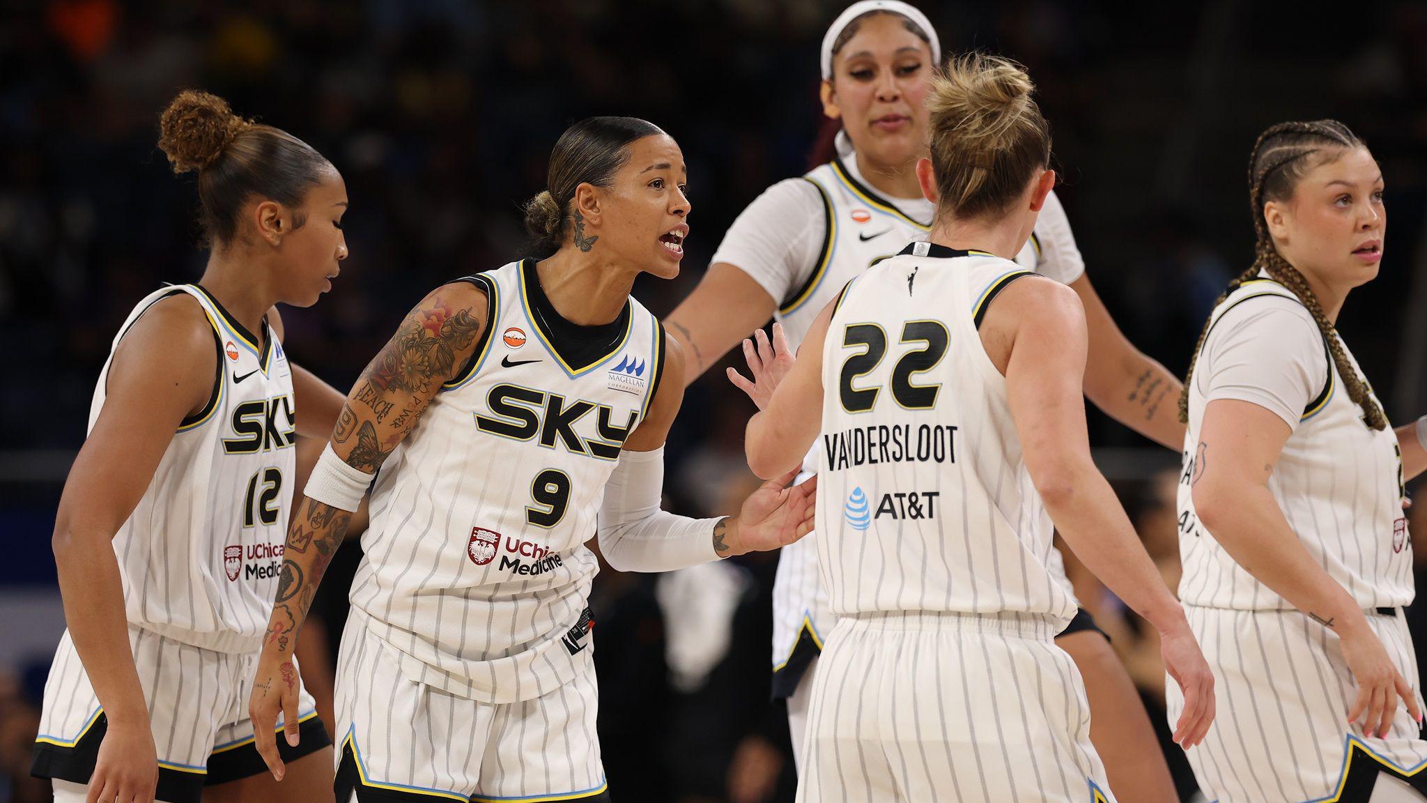 The Chicago Sky guard Natasha Cloud, second from left, speaks to team-mates during Friday's WNBA game at home to the Golden State Valkyries
