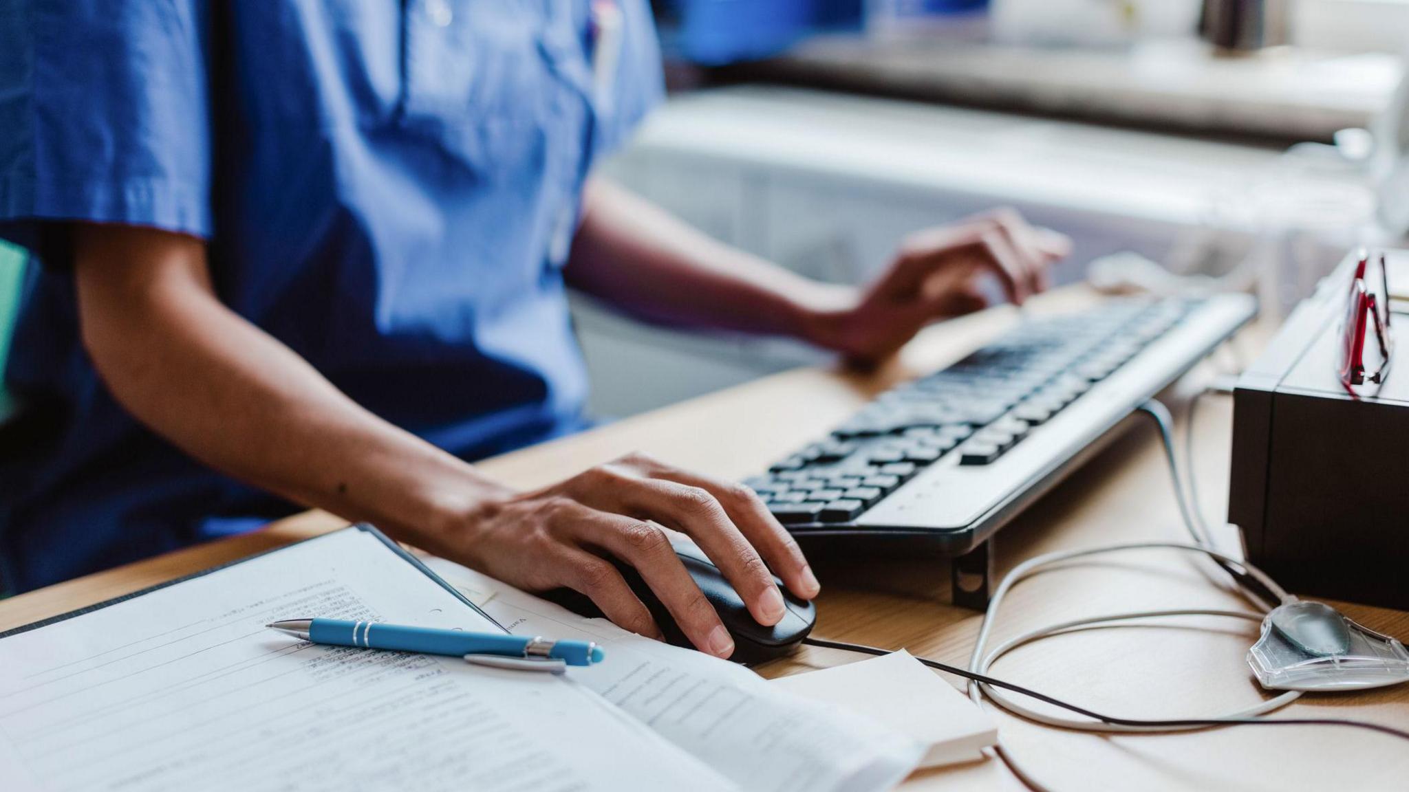 A clinician accessing a patient's electronic notes 