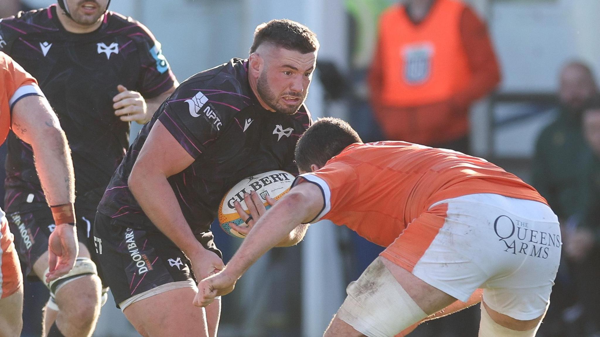 Gareth Thomas takes the ball up for Ospreys