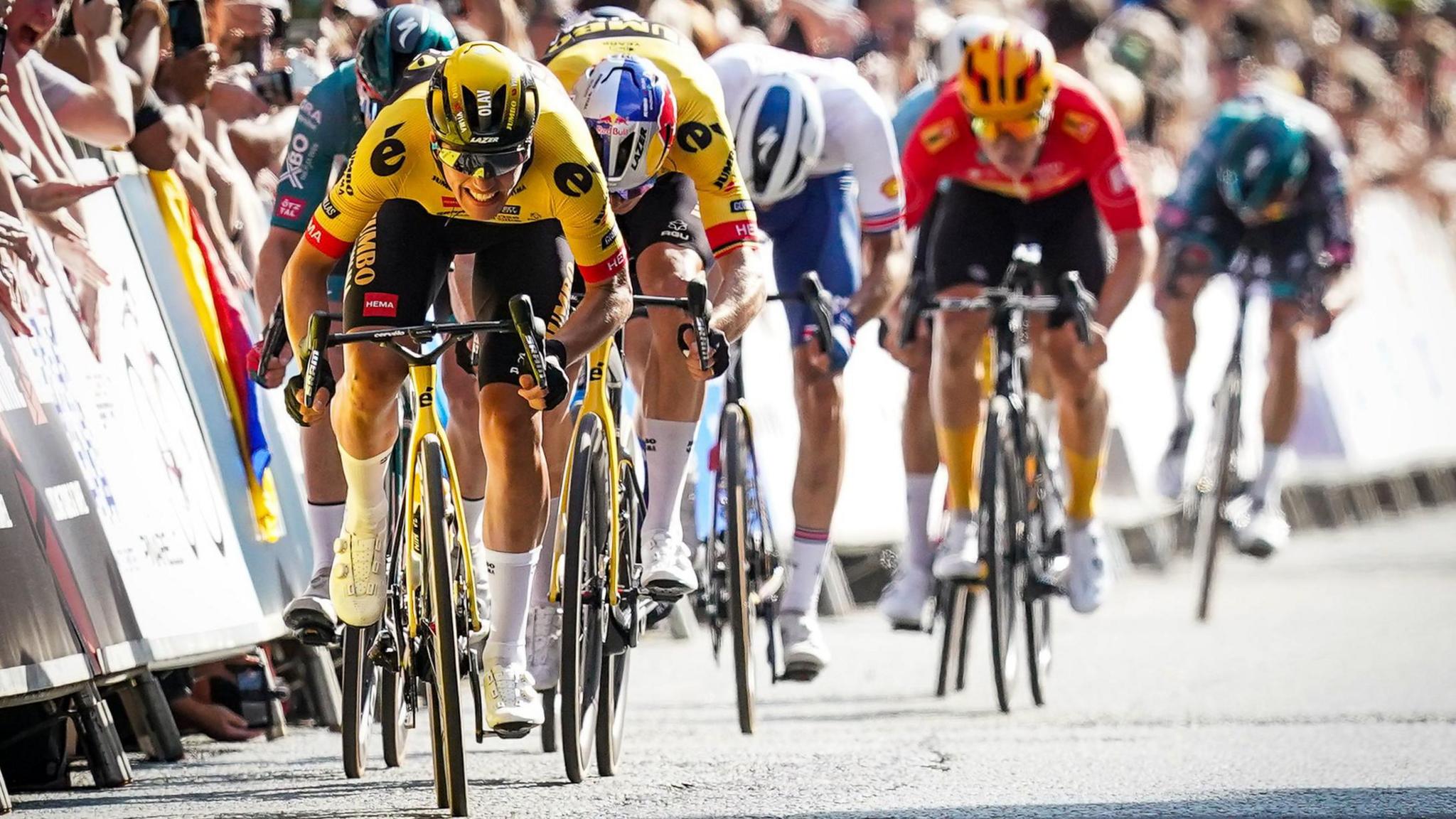 Team Jumbo–Visma’s Olav Kooij crosses the line to win stage one of the 2023 Tour of Britain, from Altrincham to Manchester