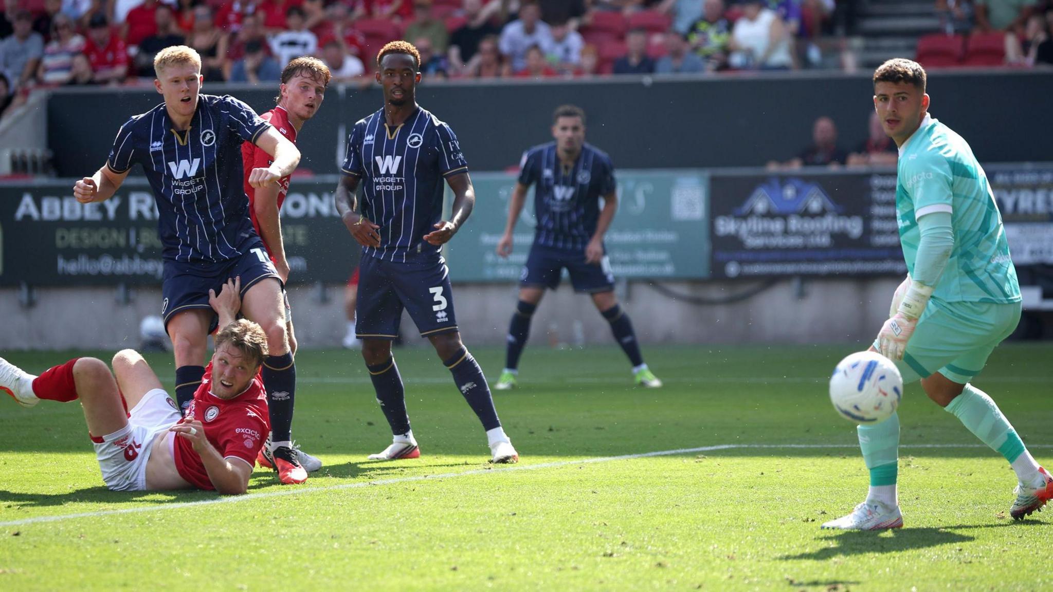 Josh Coburn's header evades a wrong-footed Sam Tickle to make it 2-0
