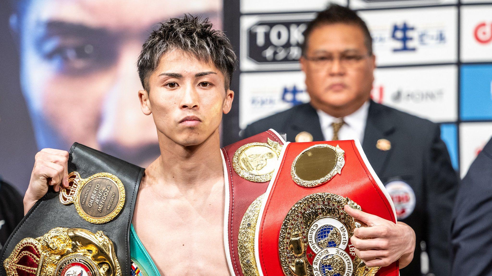 Naoya Inoue with his belts