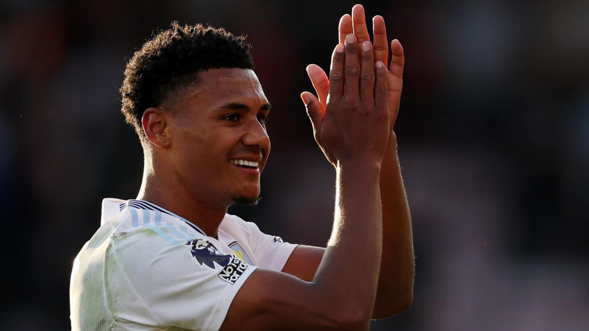Ollie Watkins applauds supporters