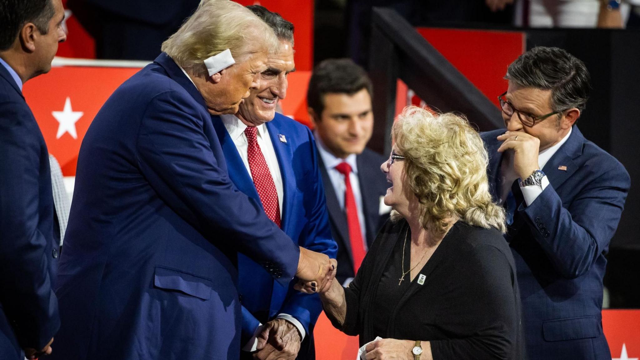 Bev Vance (R), mother of vice presidential nominee and Republican Senator from Ohio JD Vance, greets Republican presidential nominee Donald J. Trump (L) on the third day of the Republican National Convention (RNC) in the Fiserv Forum in Milwaukee,