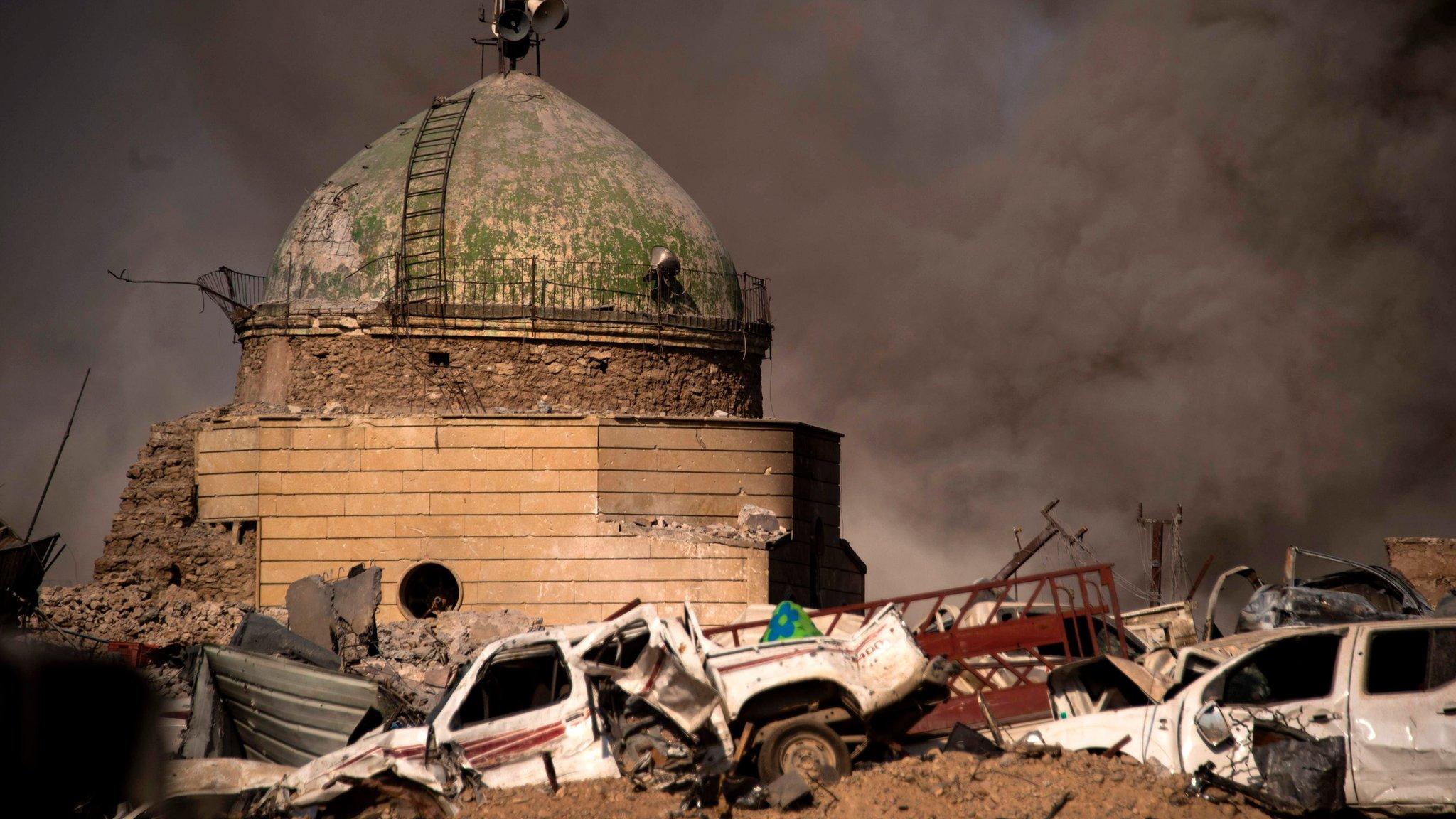 Smoke rises from Mosul's Old City on 10 July 2017