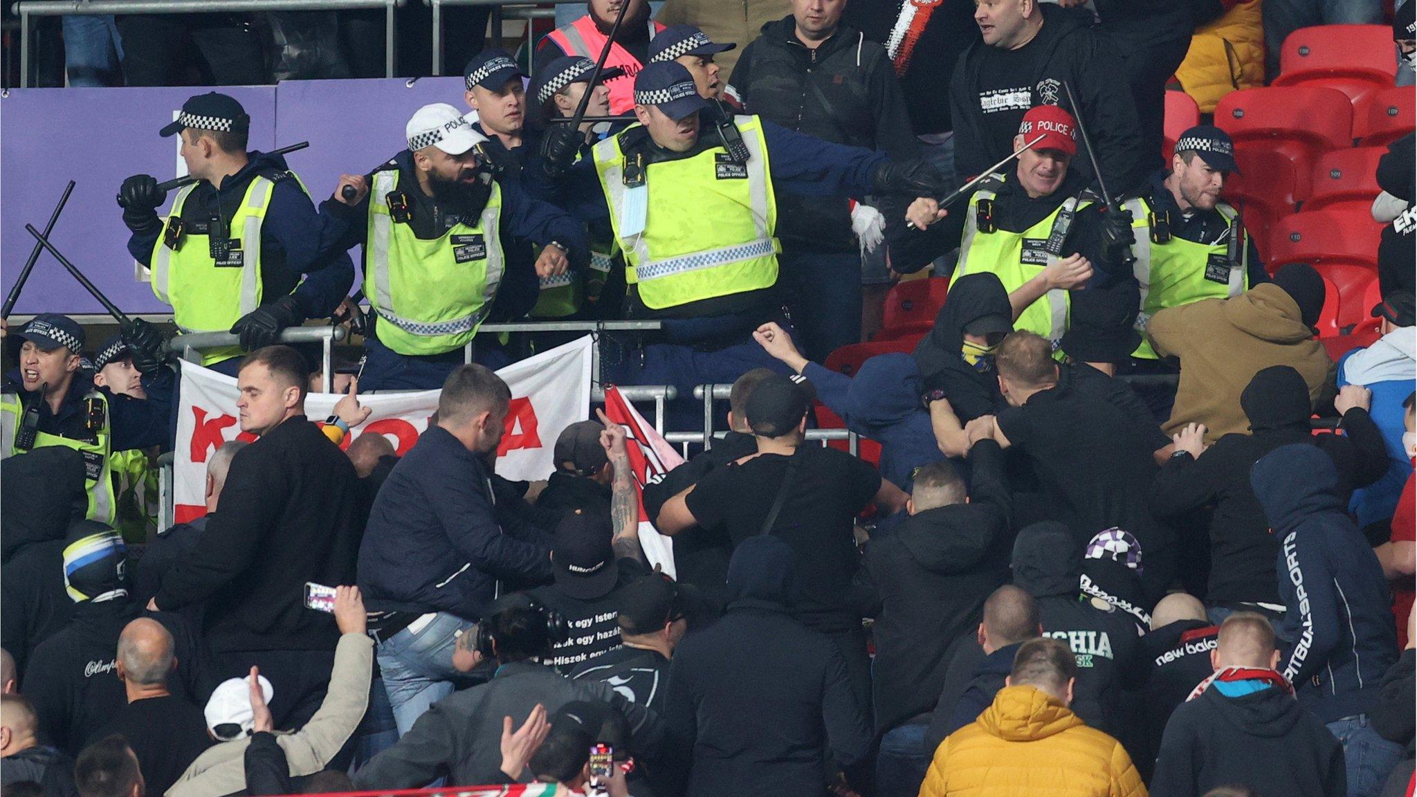 Fans clashed with stewards and police early in the game