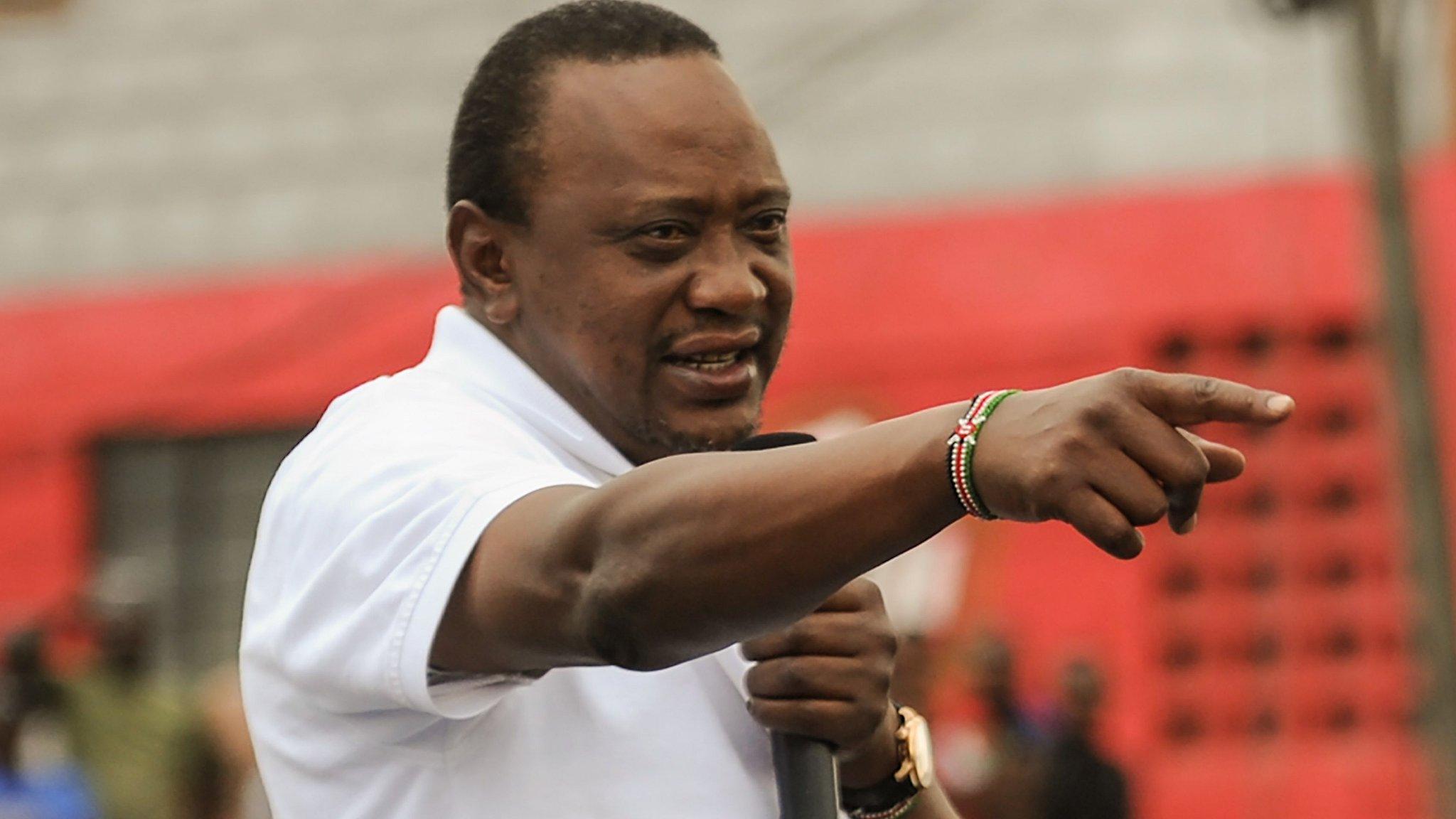 Kenya's President Uhuru Kenyatta addresses a crowd on September 1, 2017 in a Nairobi suburb