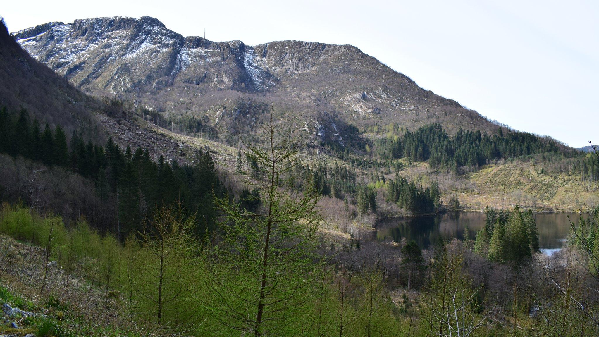 Wide shot of Isdalen Valley and surrounding mountains