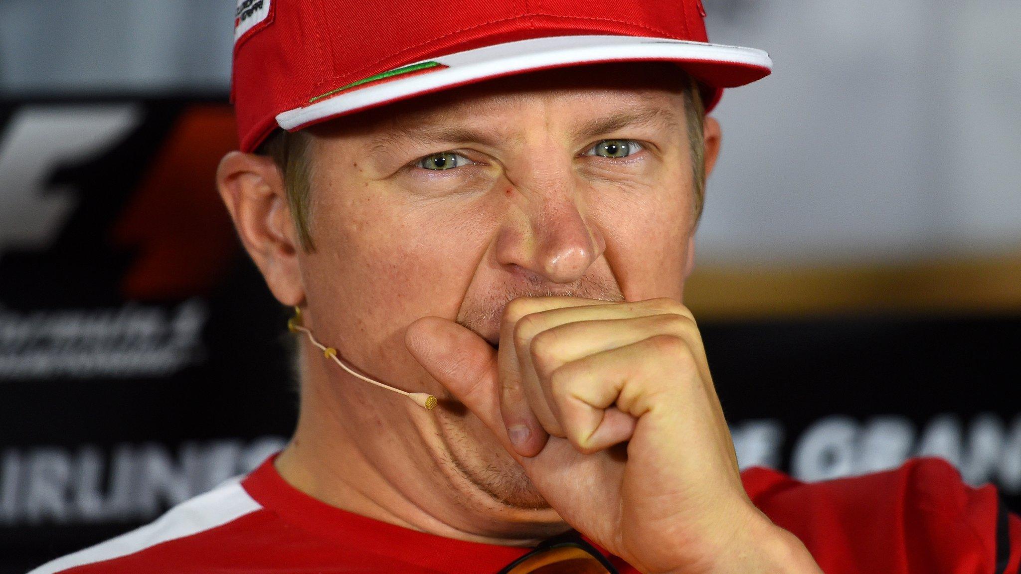 Kimi Raikkonen yawns in a press conference