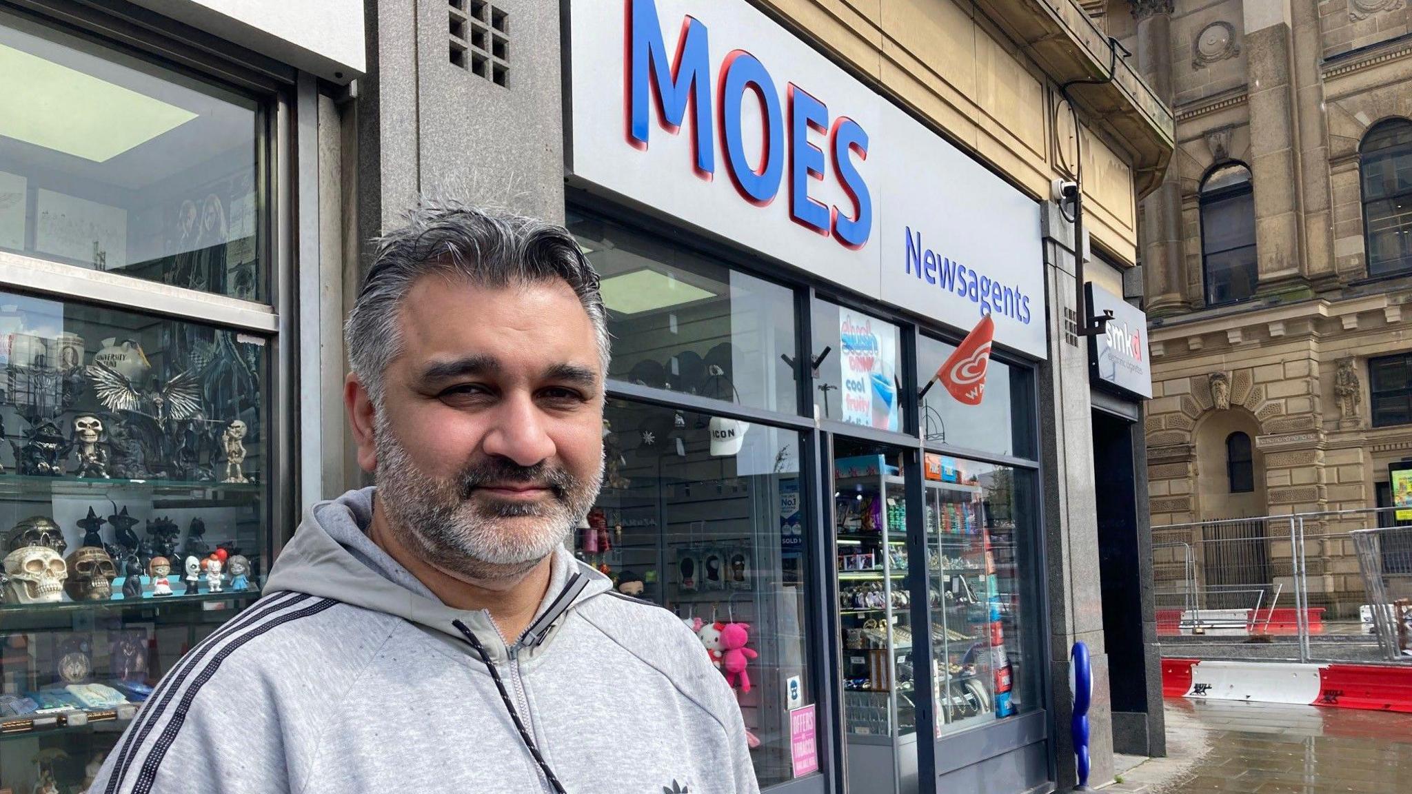 Arif Ayyub outside his newsagents in Bradford city centre