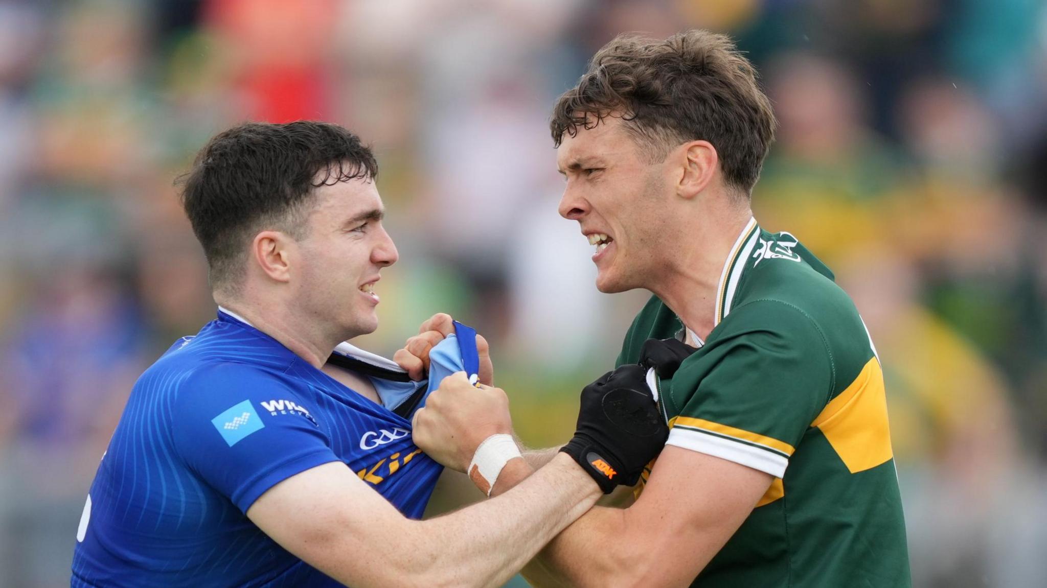 Niall Carolan and David Clifford clash