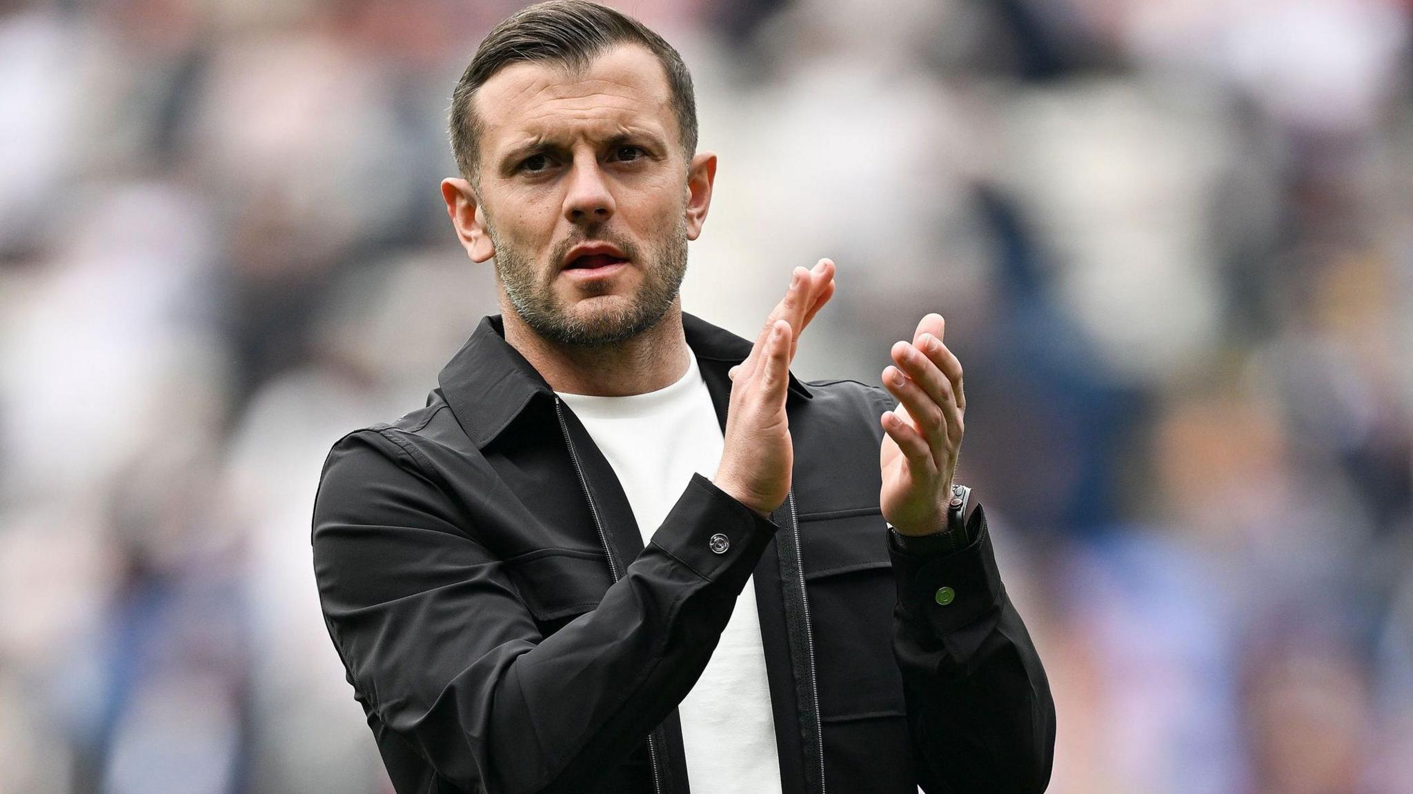 Jack Wilshere applauds Luton's supporters