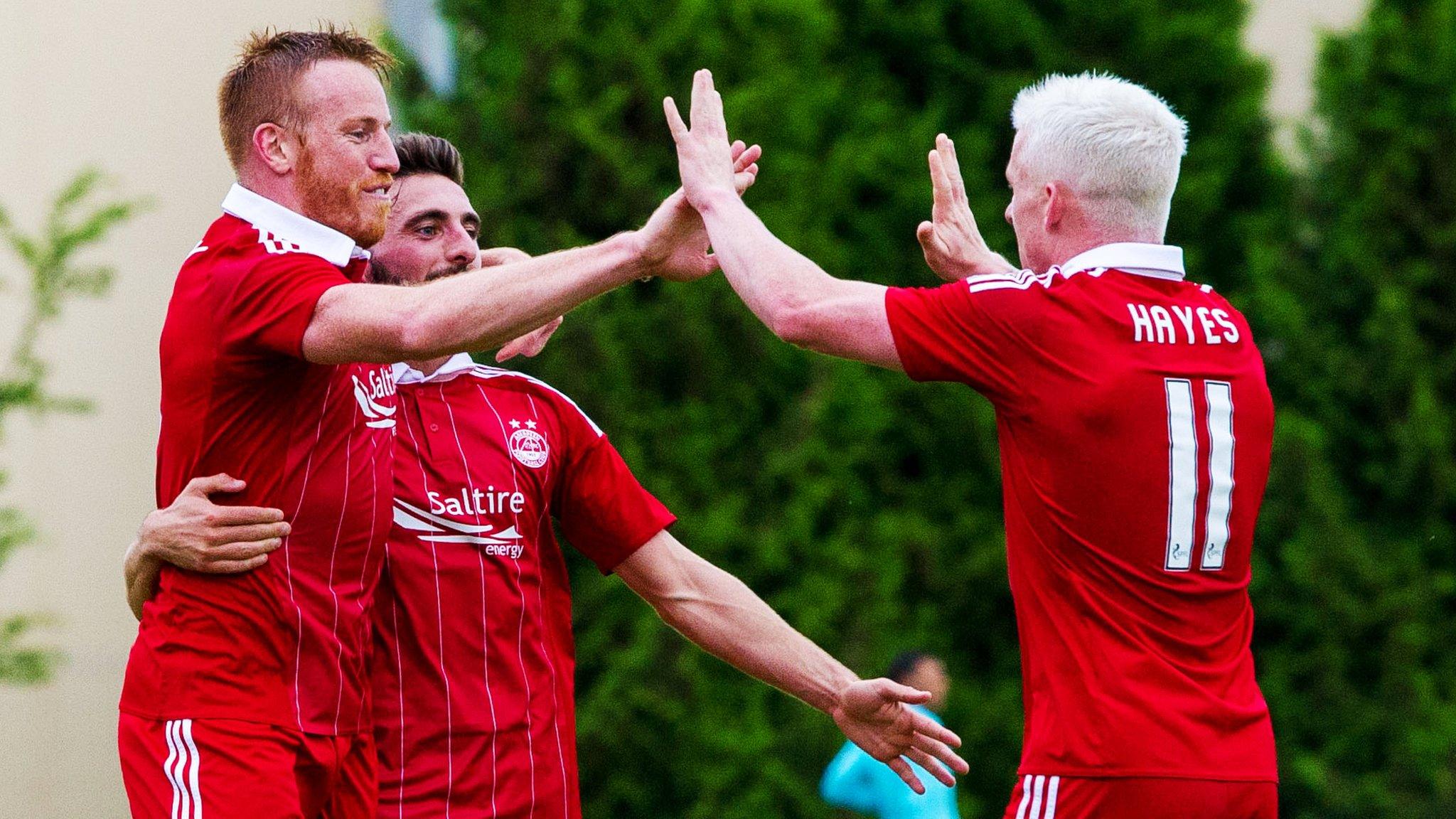 Adam Rooney, Graeme Shinnie and Jonny Hayes