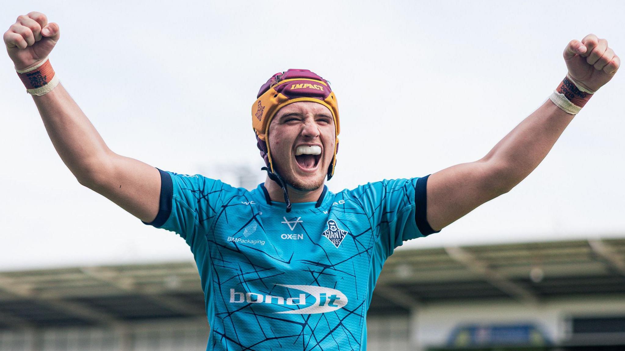George Flanagan celebrates for Huddersfield Giants