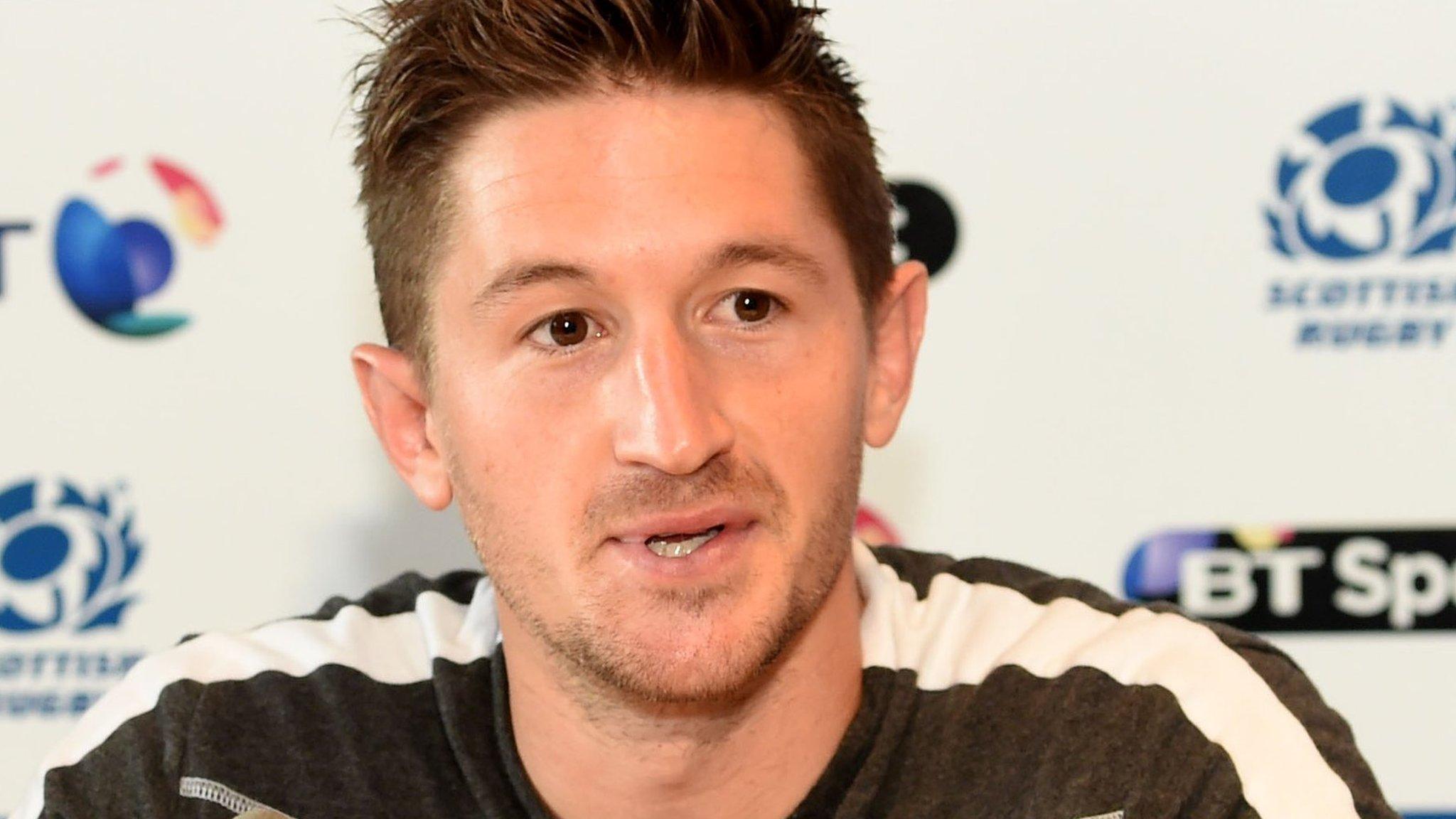 Henry Pyrgos talks to the media in Japan