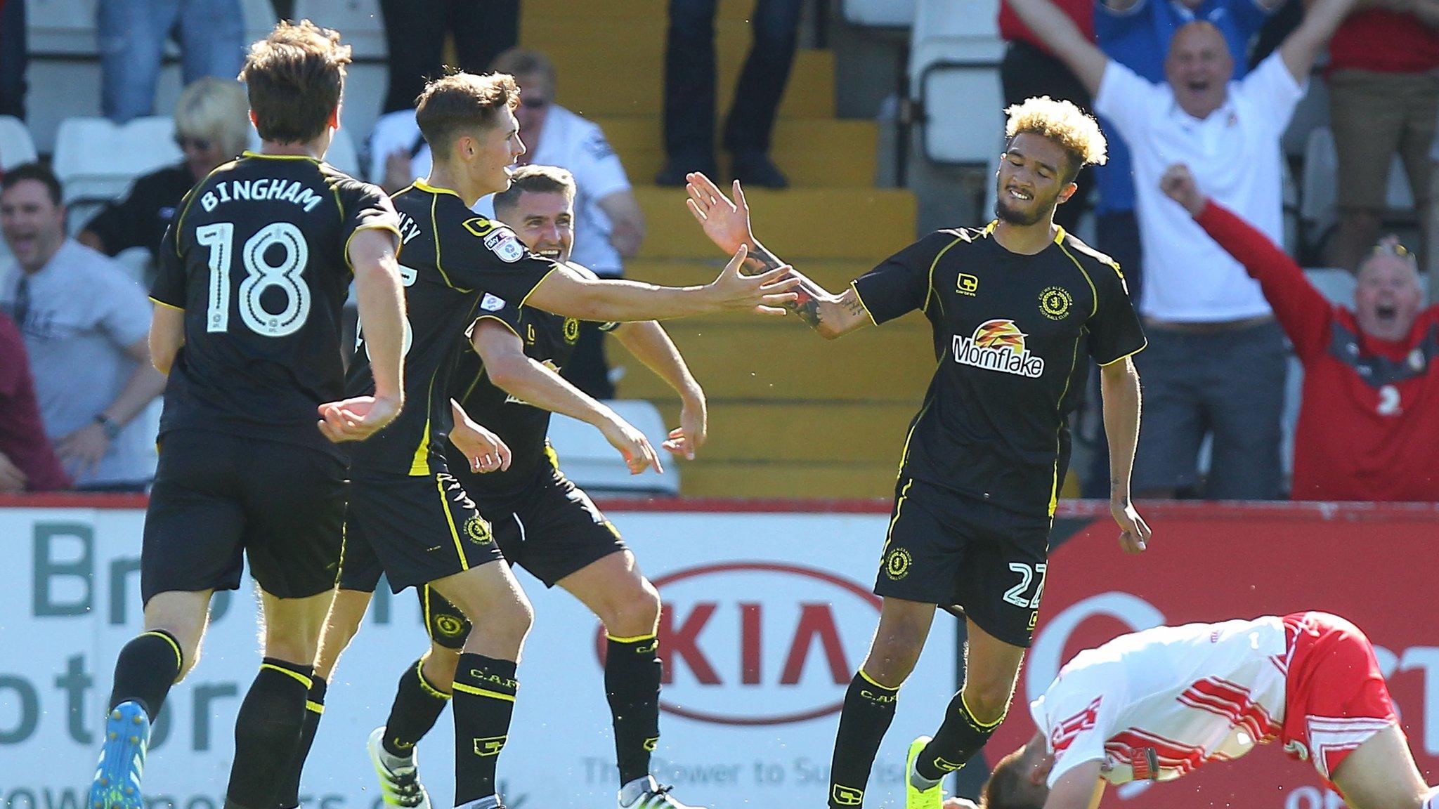 Alex Kiwomya (right) celebrating scoring a goal for Crewe