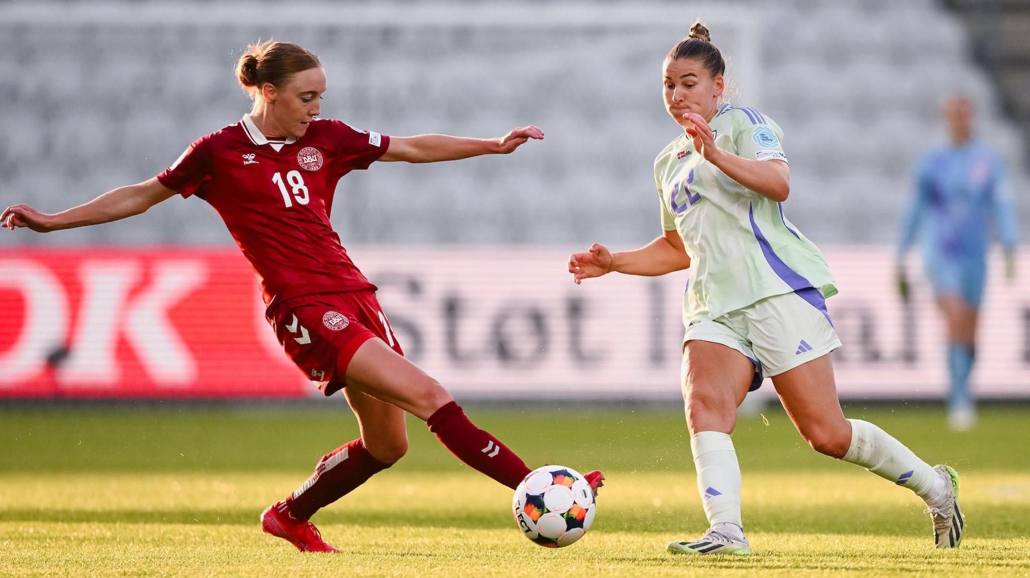 Alice Griffiths looks to win the ball back for Wales