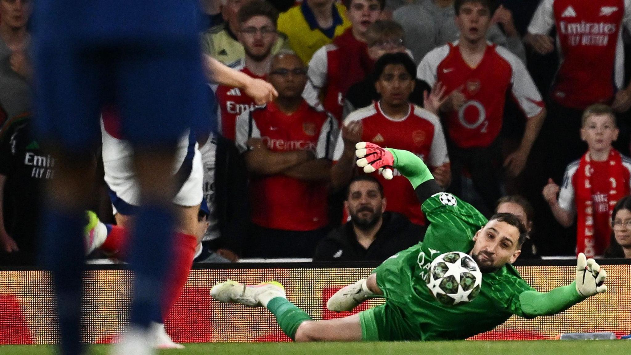 PSG goalkeeper Gianluigi Donnarumma saves Gabriel Martinelli's shot during his side's 1-0 win at Emirates Stadium in the first leg of their Champions League semi-final