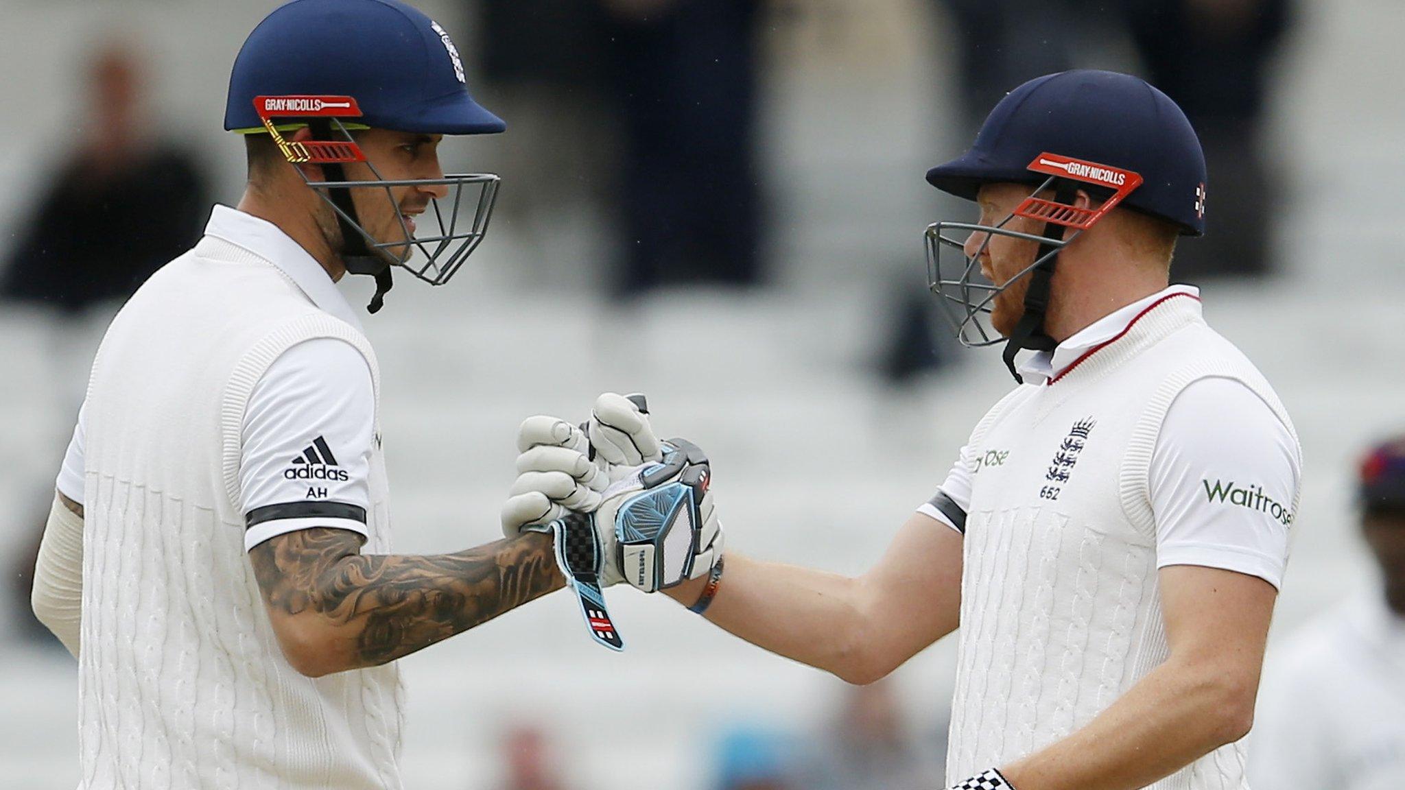 Alex Hales and Jonny Bairstow celebrate their 50 partnership