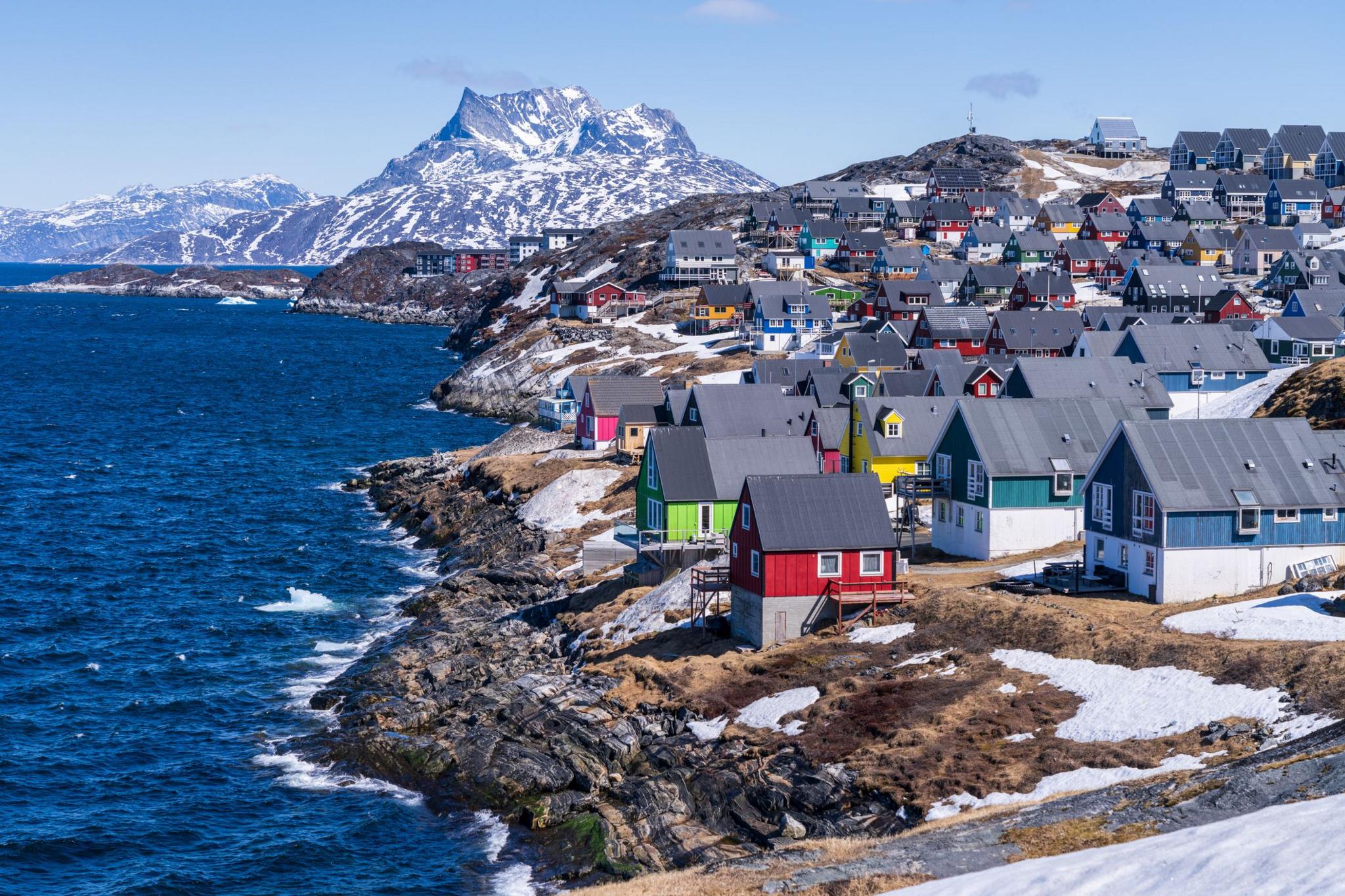 Scenic view of colorful houses nestled along the coast of Nuuk, Greenland