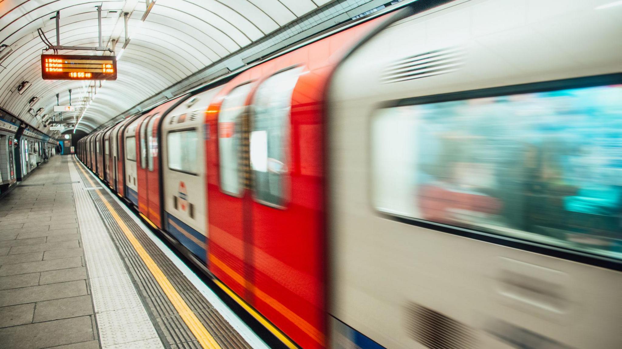 a London tube that's blurry as still in motion.