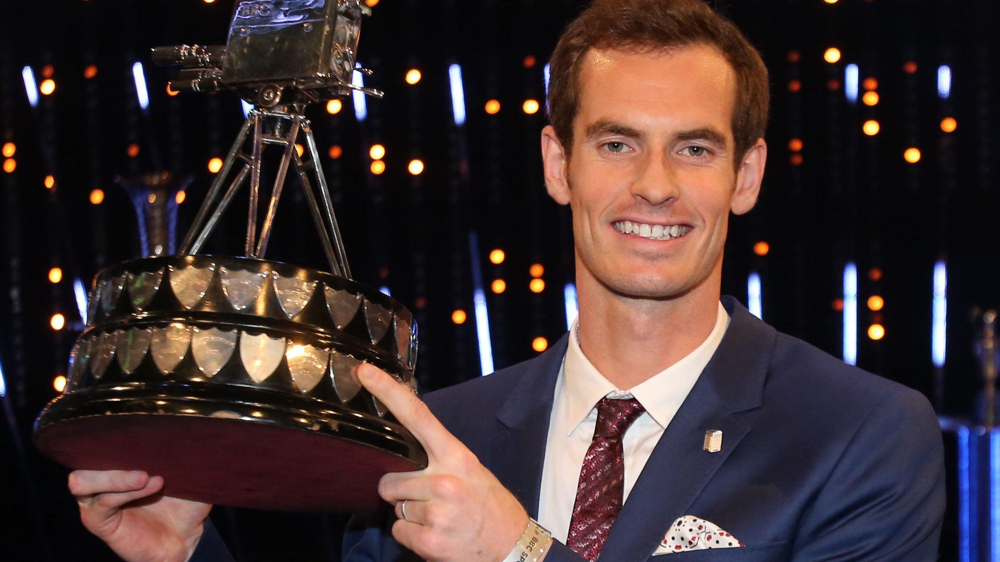 Andy Murray lifts the Sports Personality trophy