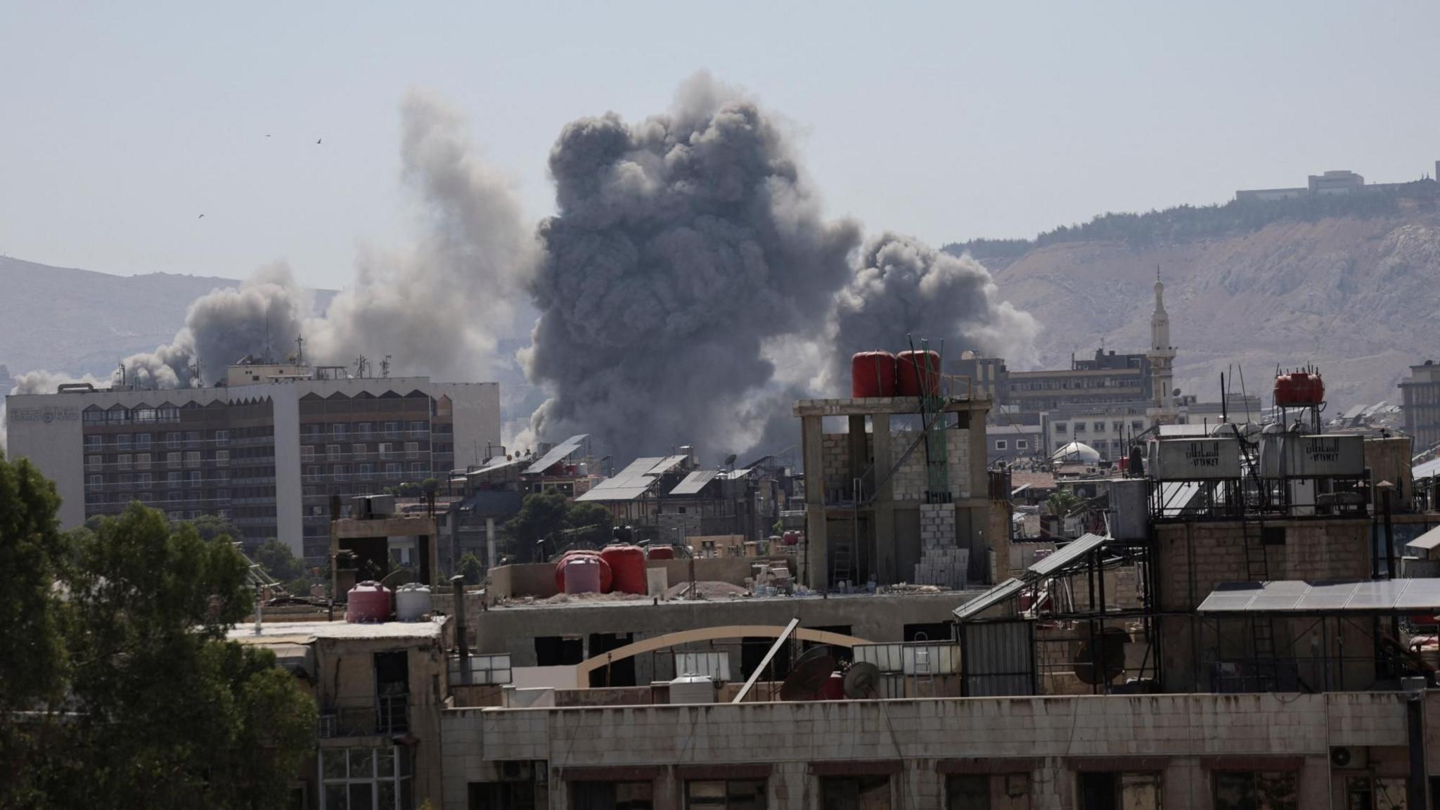 Smoke rises after an Israeli strike on Syria's defence ministry headquarters in Damascus, Syria (16 July 2025)