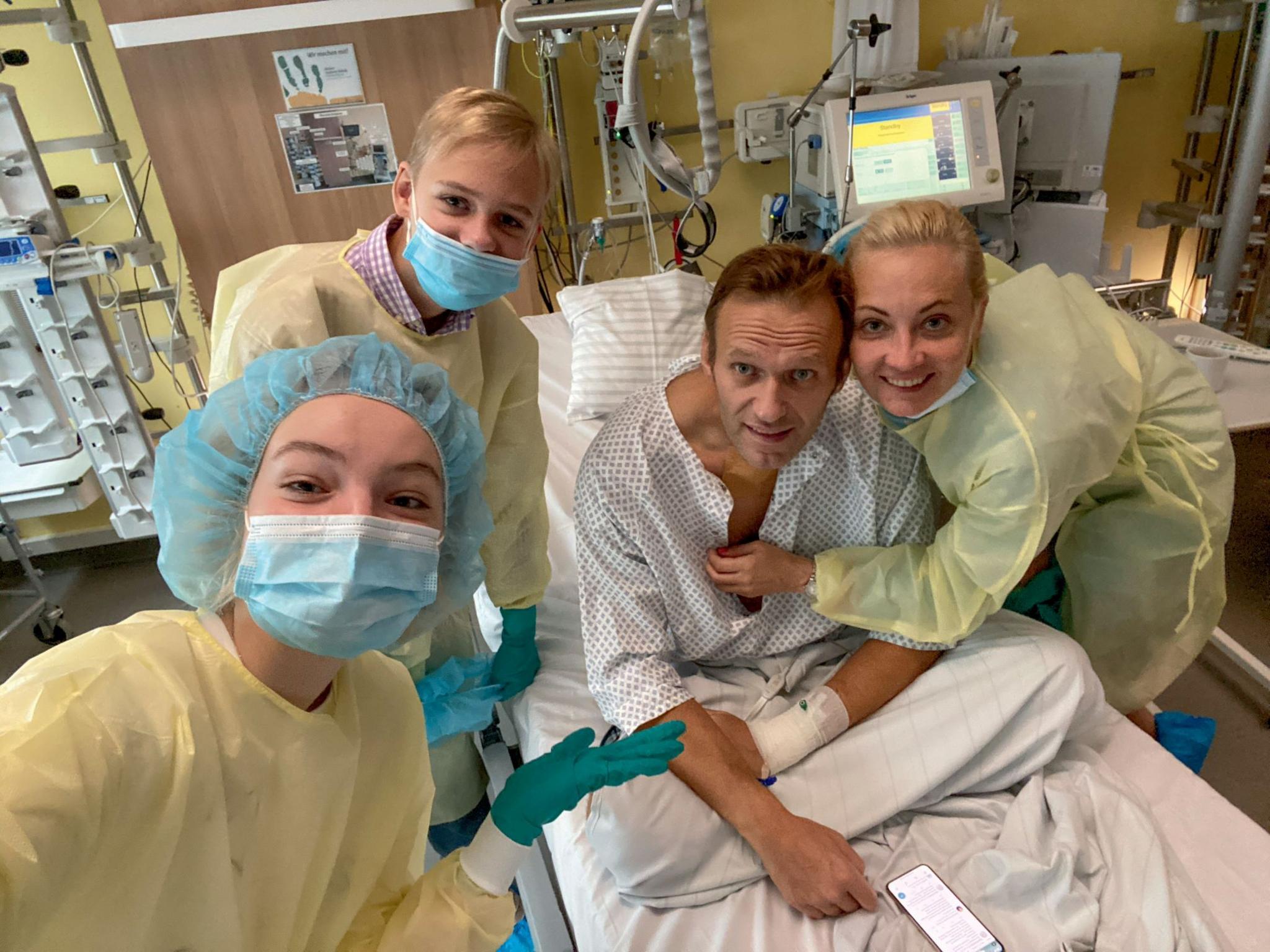 Alexei surrounded by his family, during his recovery from Novichok poisoning in 2020