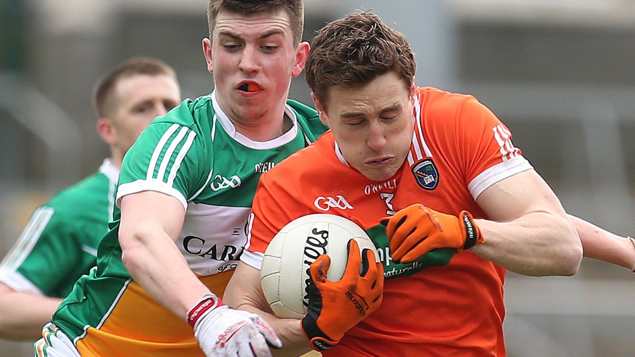 Offaly's James Lawlor challenges Armagh defender Charlie Vernon