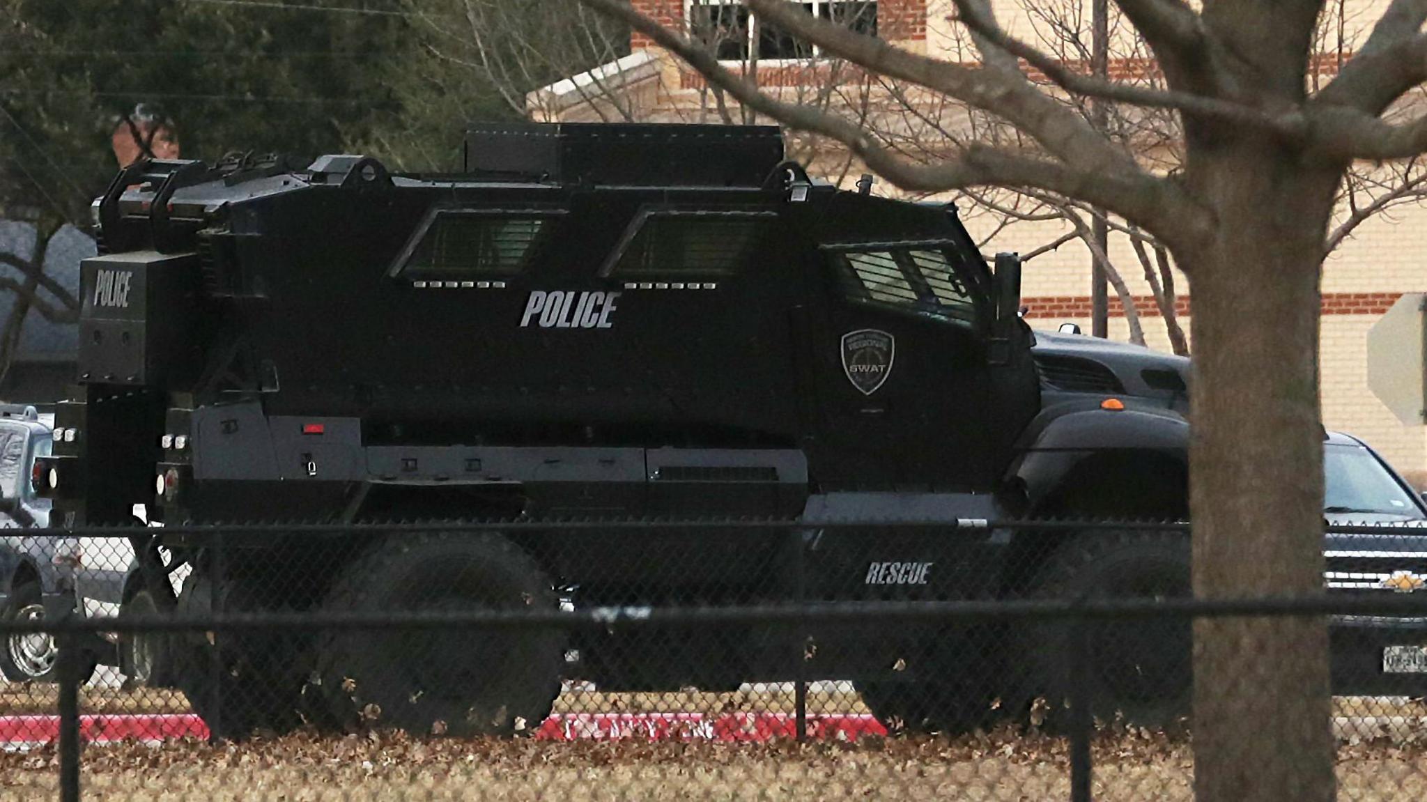 A large armoured vehicle at the scene